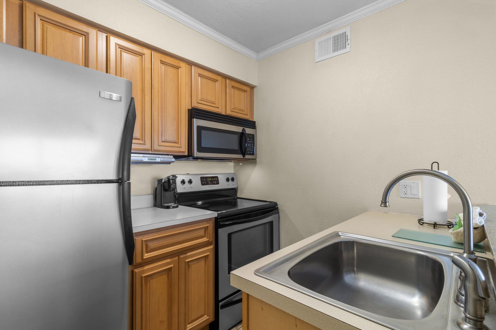 image Cook up a feast in this fully equipped kitchen, ready for your culinary adventures.