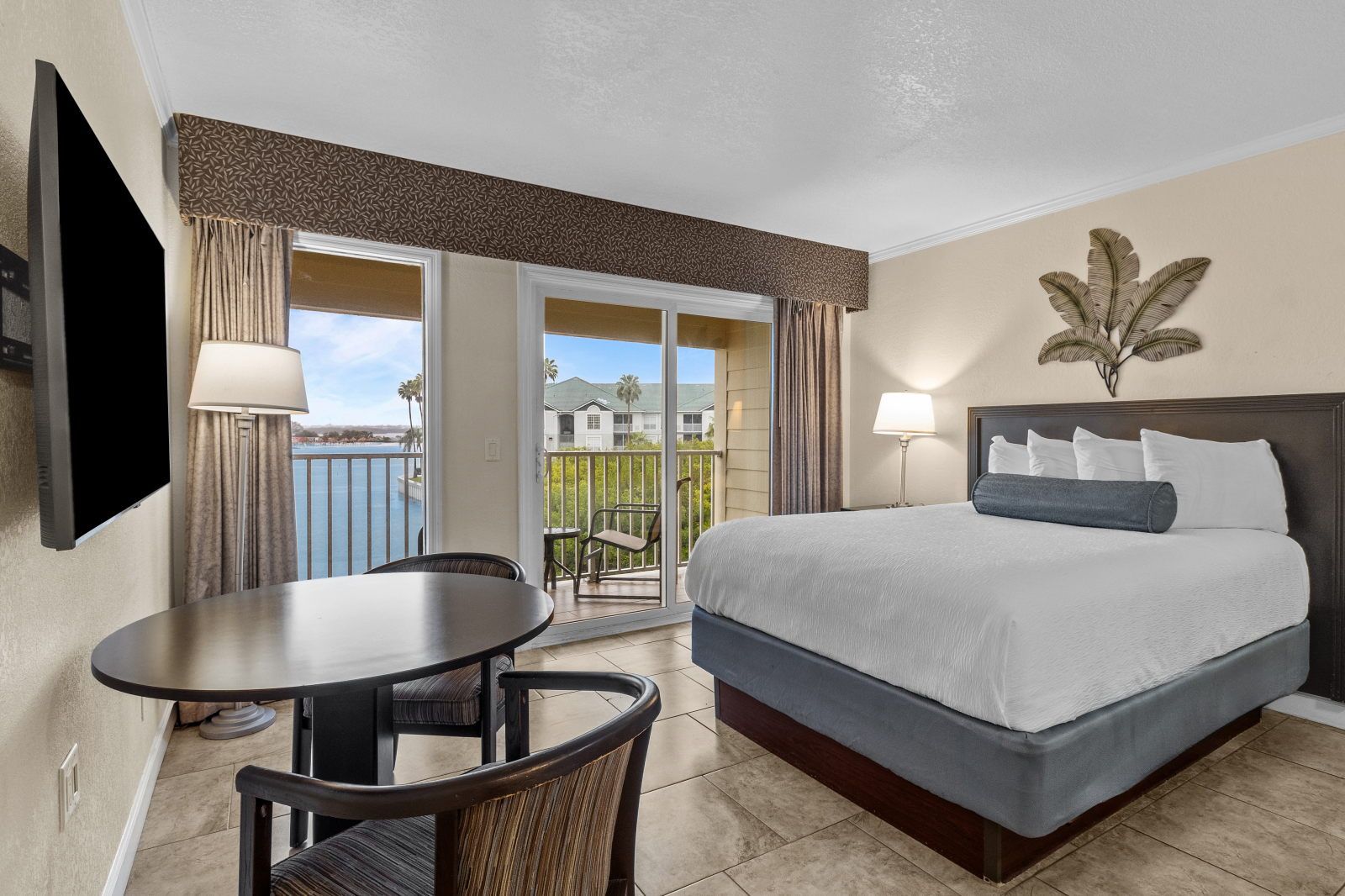 image Step inside a spacious suite, where a large window invites sunshine and offers stunning views.