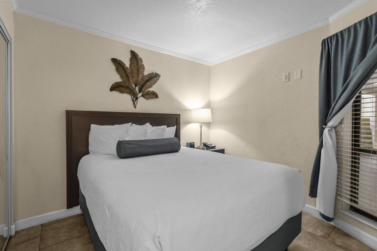image Sleep soundly in the cozy queen bed, a restful retreat after a day of fun.