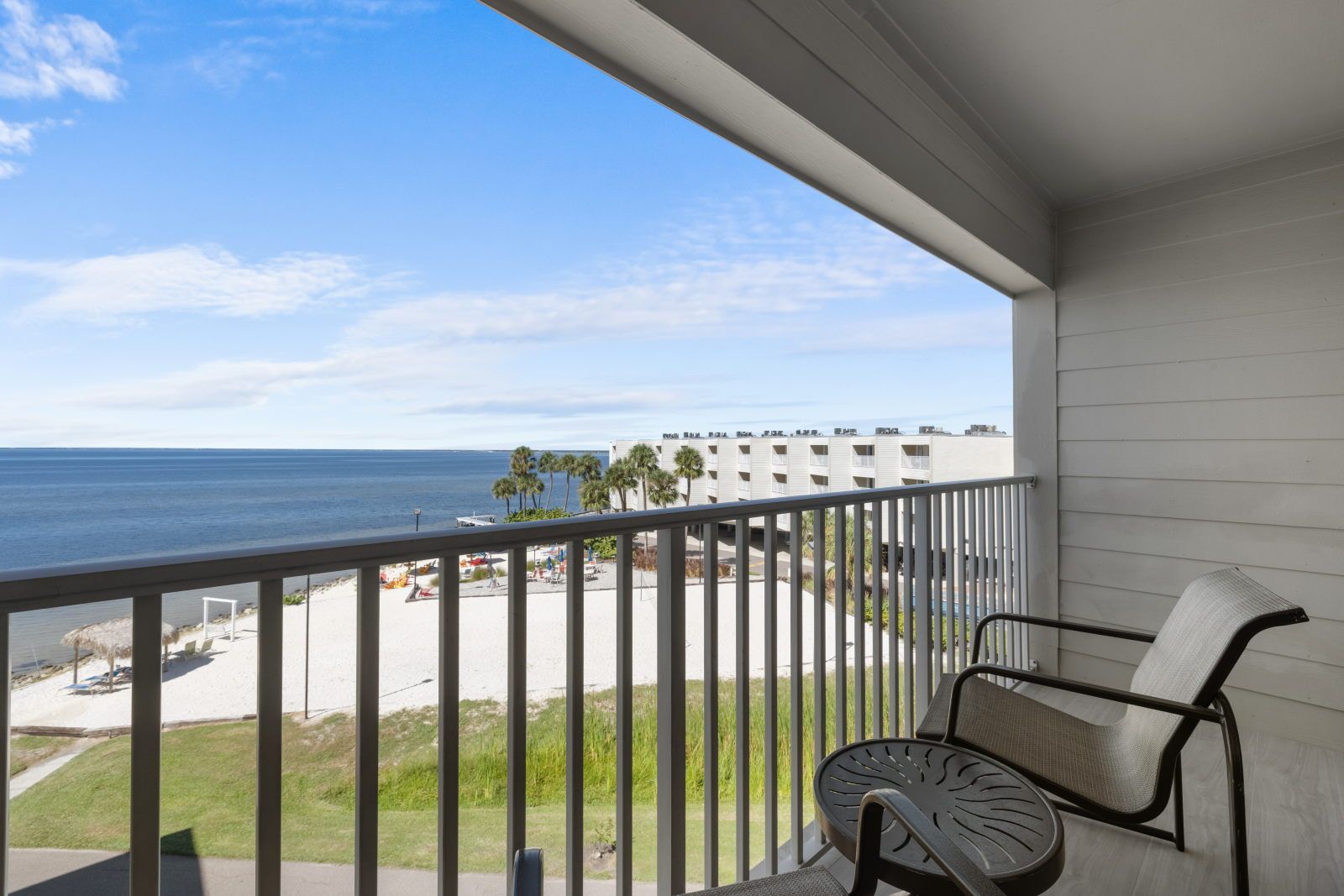 image Sip your coffee while soaking in the tranquil bay views from your private balcony.