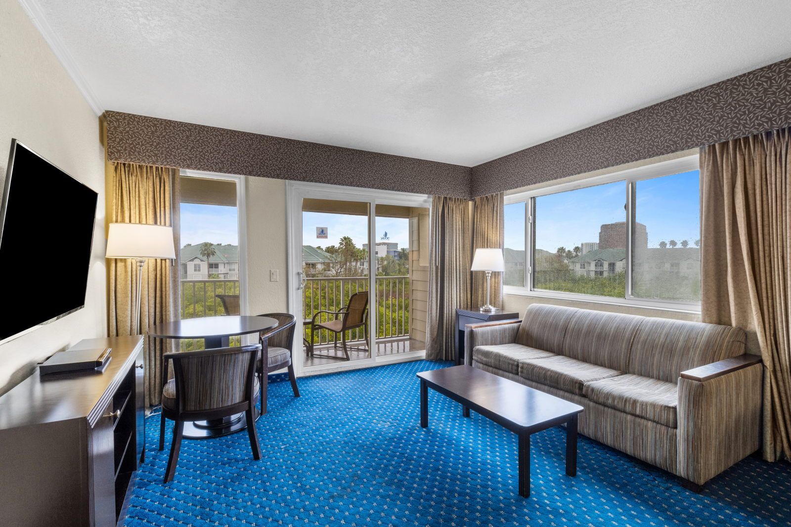image Relax in a cozy living area, where natural light and serene decor invite you to unwind.