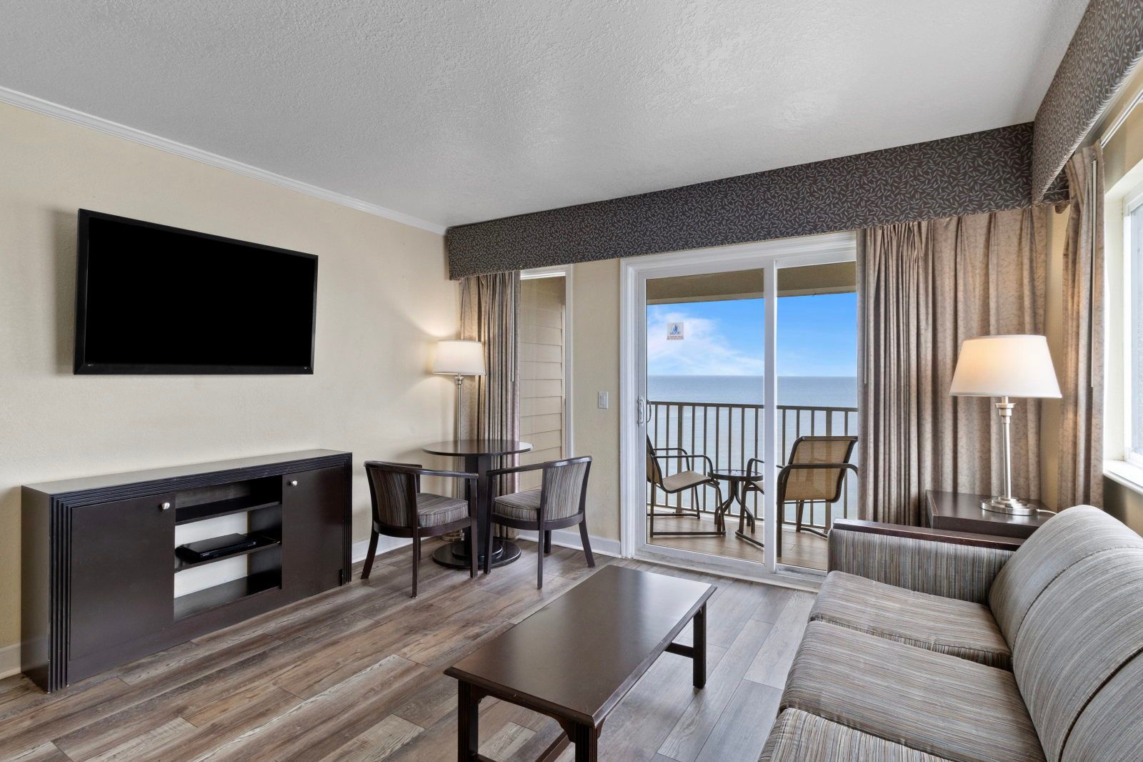 image Natural light pours in, illuminating the inviting living area perfect for gathering or enjoying a quiet moment.