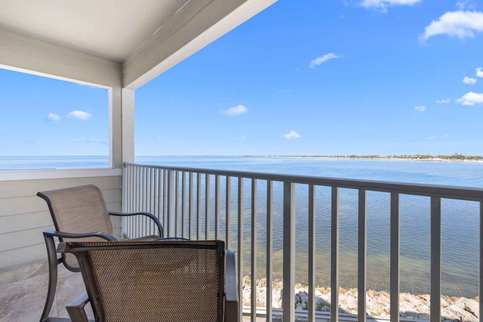 image Enjoy a peaceful moment on your private balcony, soaking in the tranquil waters of Tampa Bay.