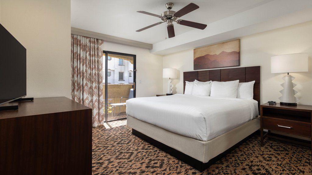 image Sleep soundly in the spacious bedroom, complete with a king-size bed and soft linens.