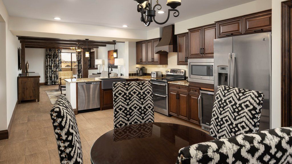 image Cook in style! This fully equipped kitchen features modern appliances and chic dining space for memorable meals.