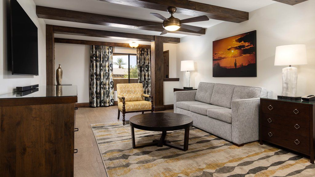 image Relax in the comfortable living area, where inviting furnishings and natural light create a warm, welcoming vibe.