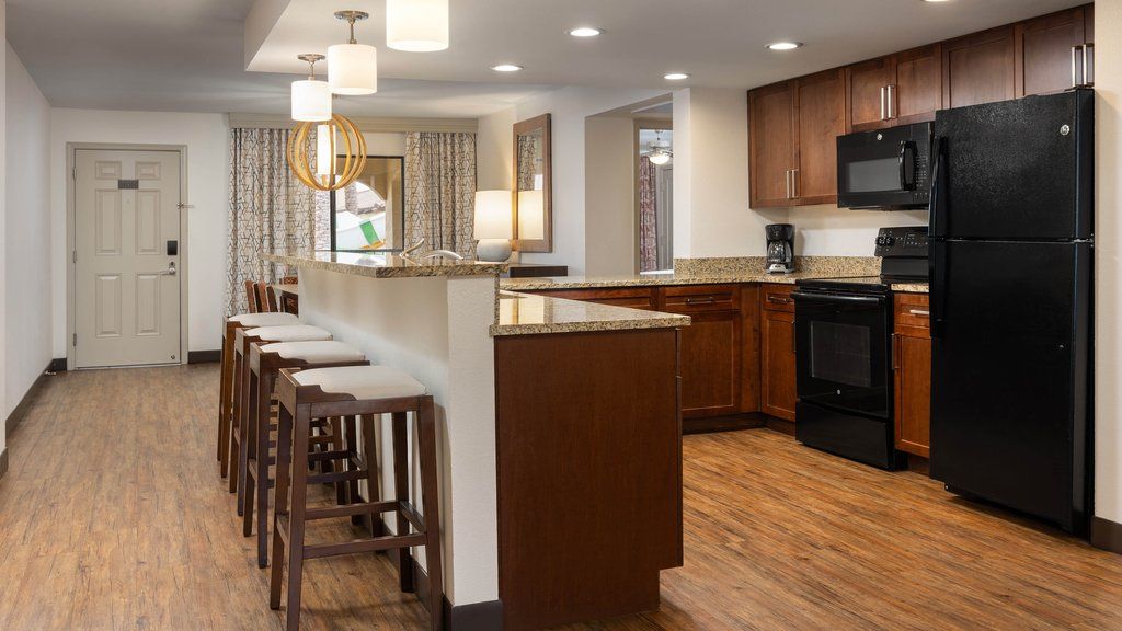 image Cook with ease in this spacious, fully equipped kitchen featuring modern appliances.