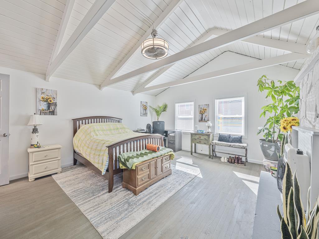 image Bedroom with indoor plants and a relaxed, open layout.