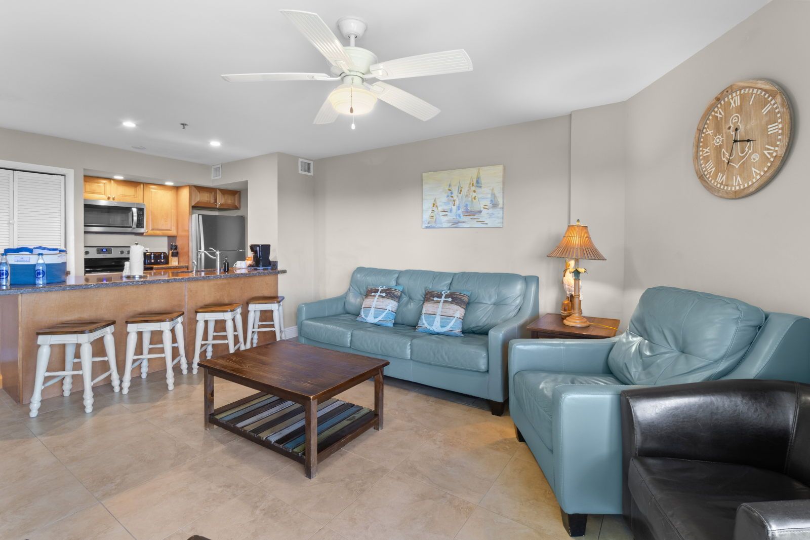 image Relax in the cozy living area, complete with plush seating and a welcoming atmosphere.