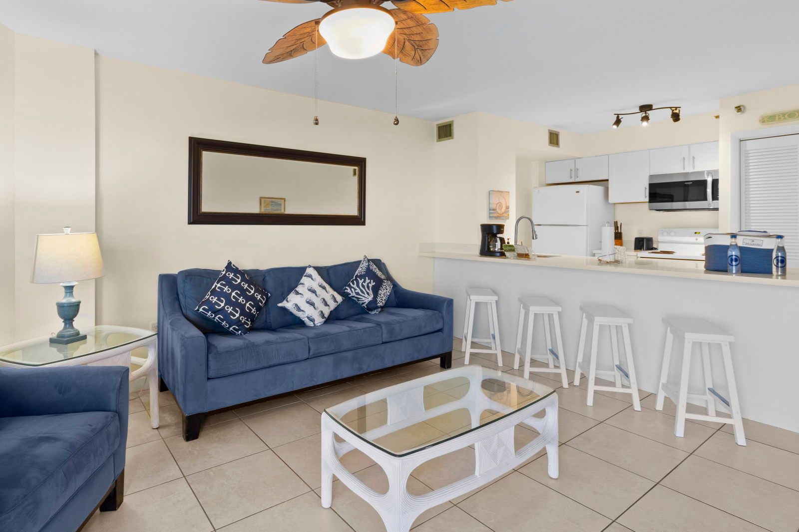 image Gather around the inviting living area, designed for leisure and connection with plush seating and a welcoming atmosphere.