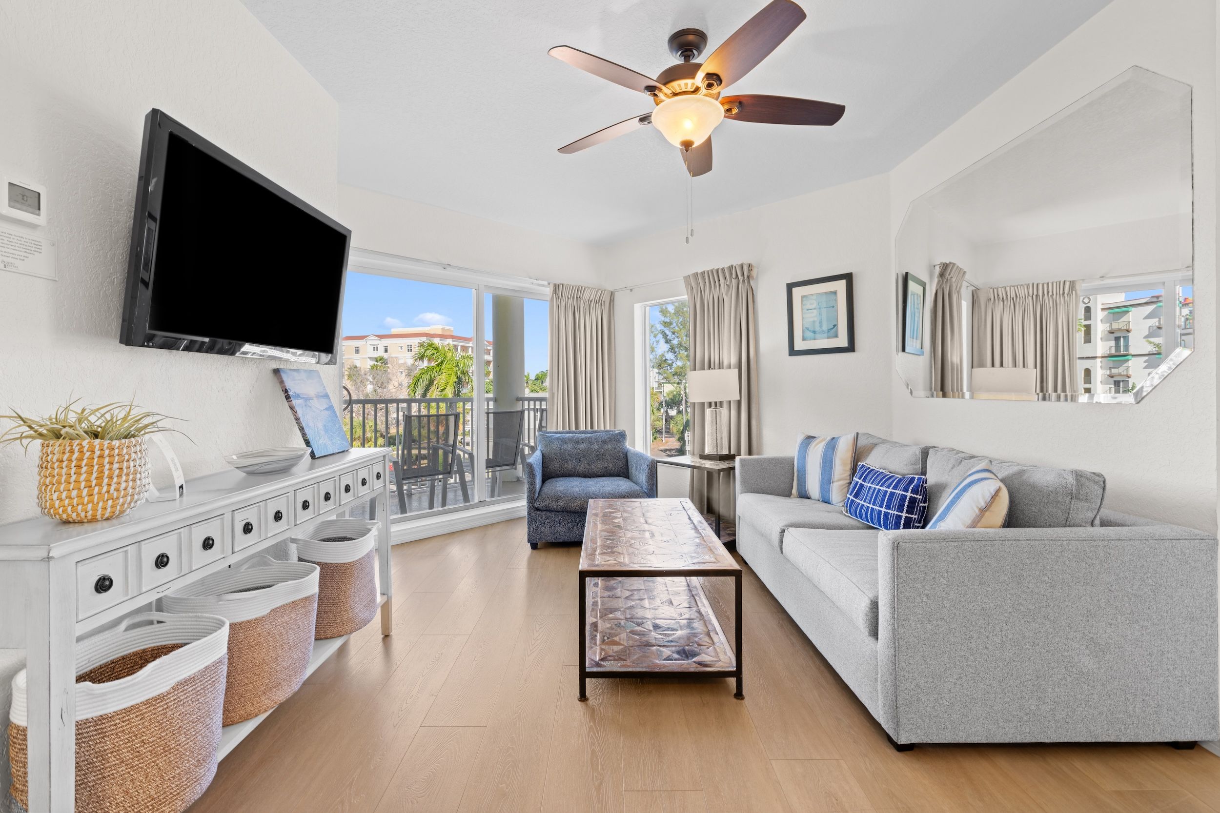 image Unwind on the plush sofa in the inviting living area, perfect for gathering and enjoying time with loved ones.