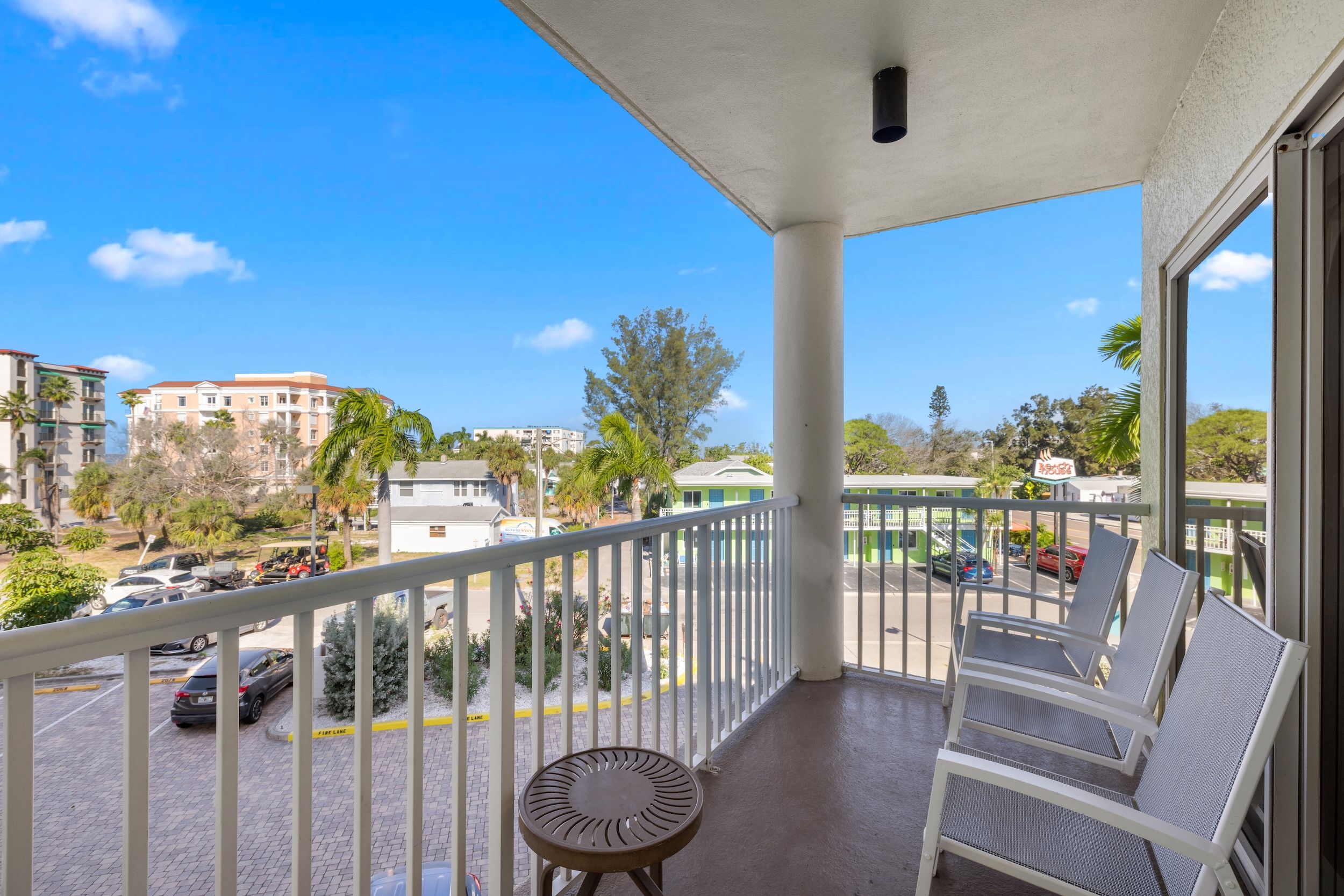 image Step onto the private balcony and enjoy a refreshing drink while soaking up the sunshine.