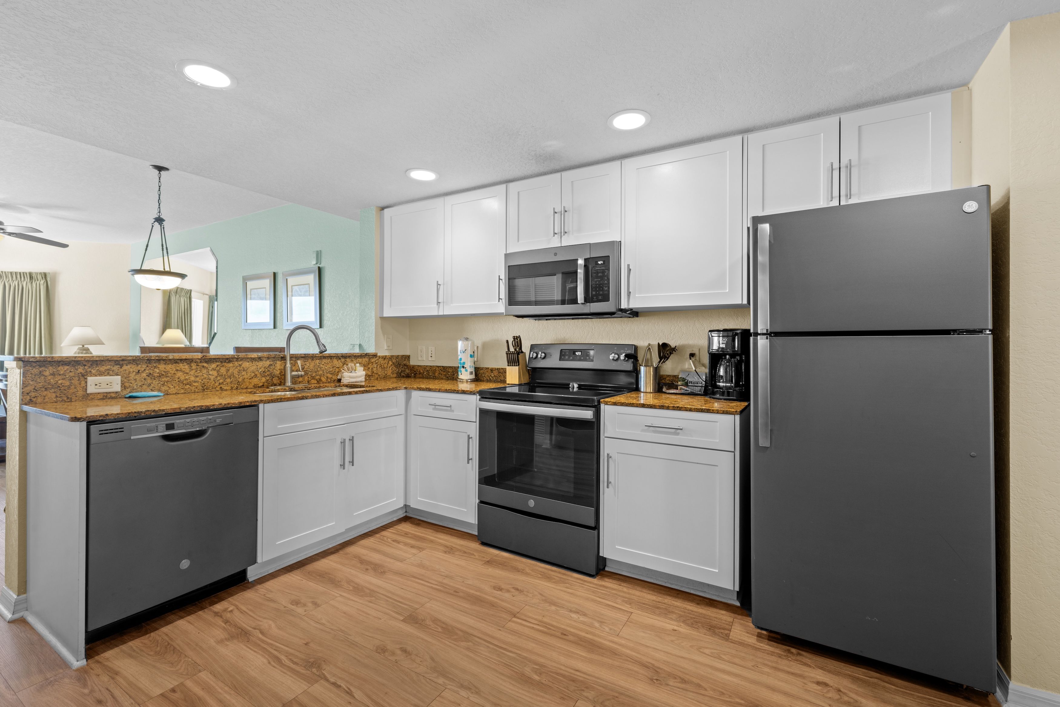image Experience effortless cooking in this spacious kitchen, featuring full-size appliances and plenty of counter space.