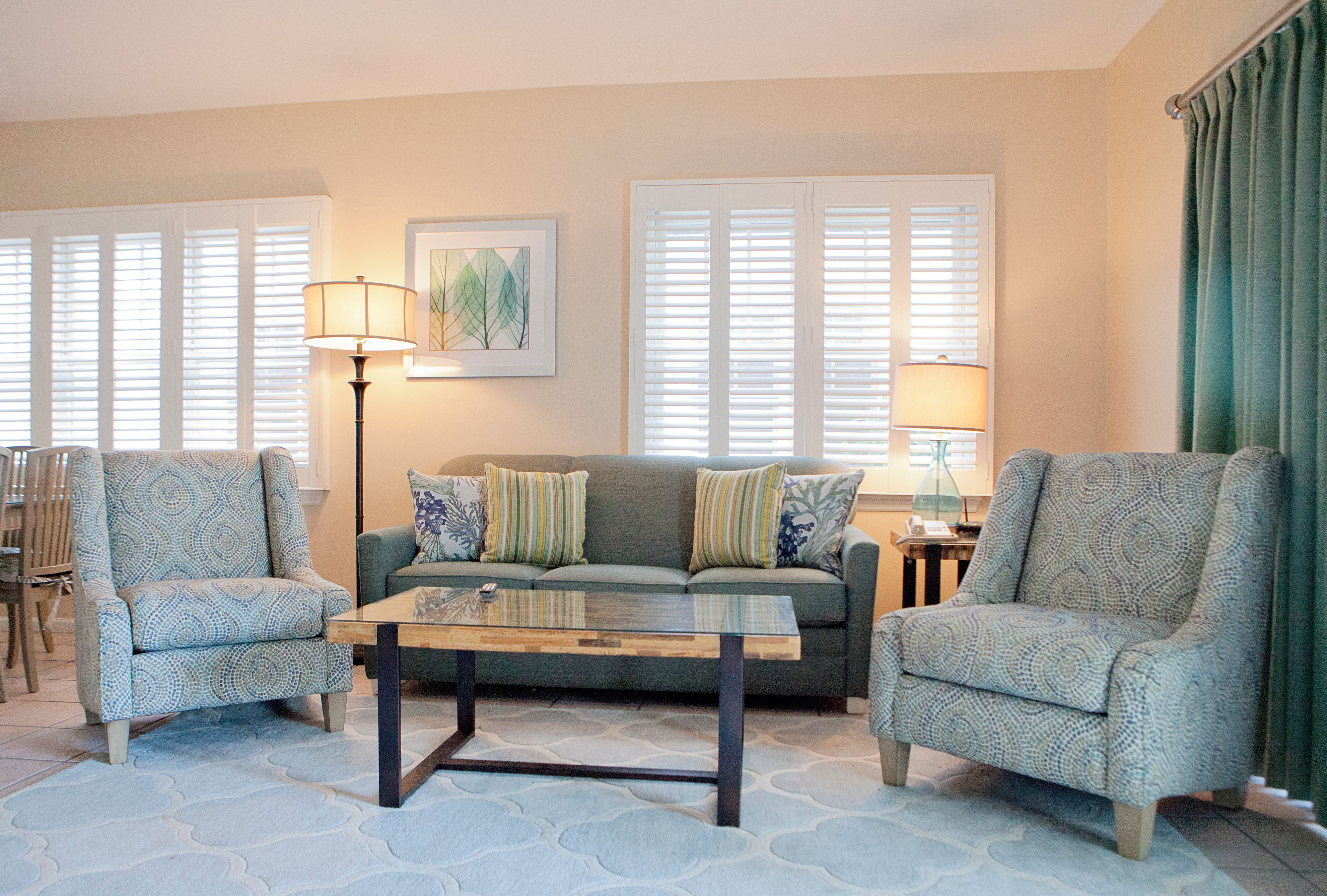 image The open living room area has cable TV. 