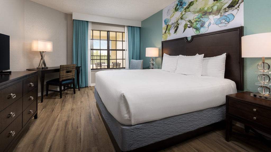 image Wake up to comfort in this inviting bedroom featuring soft linens and a serene color palette — your peaceful retreat awaits.