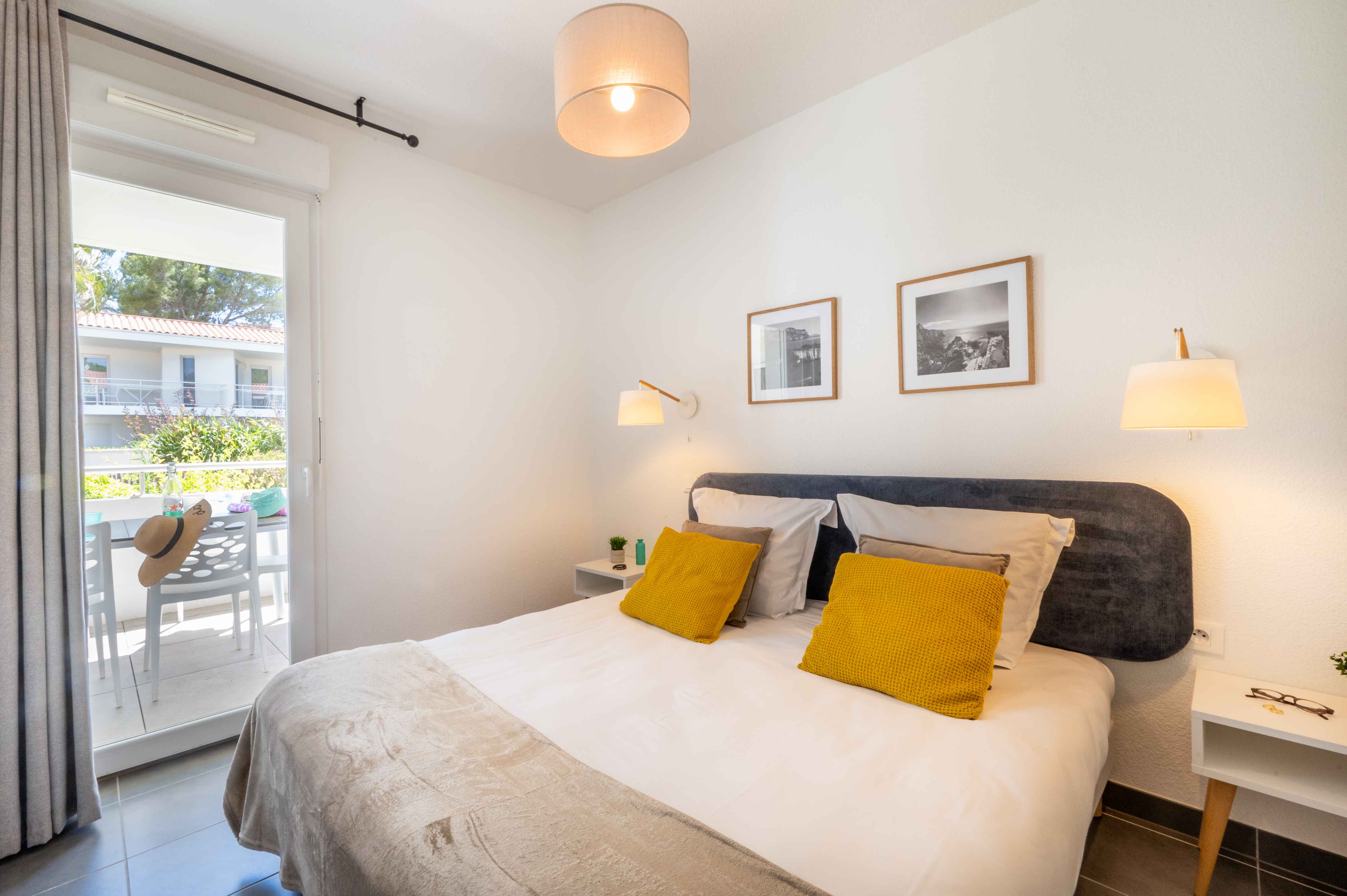 image Welcoming double bedroom with warm décor and quality linens, your private retreat after a day exploring the Var coastline.