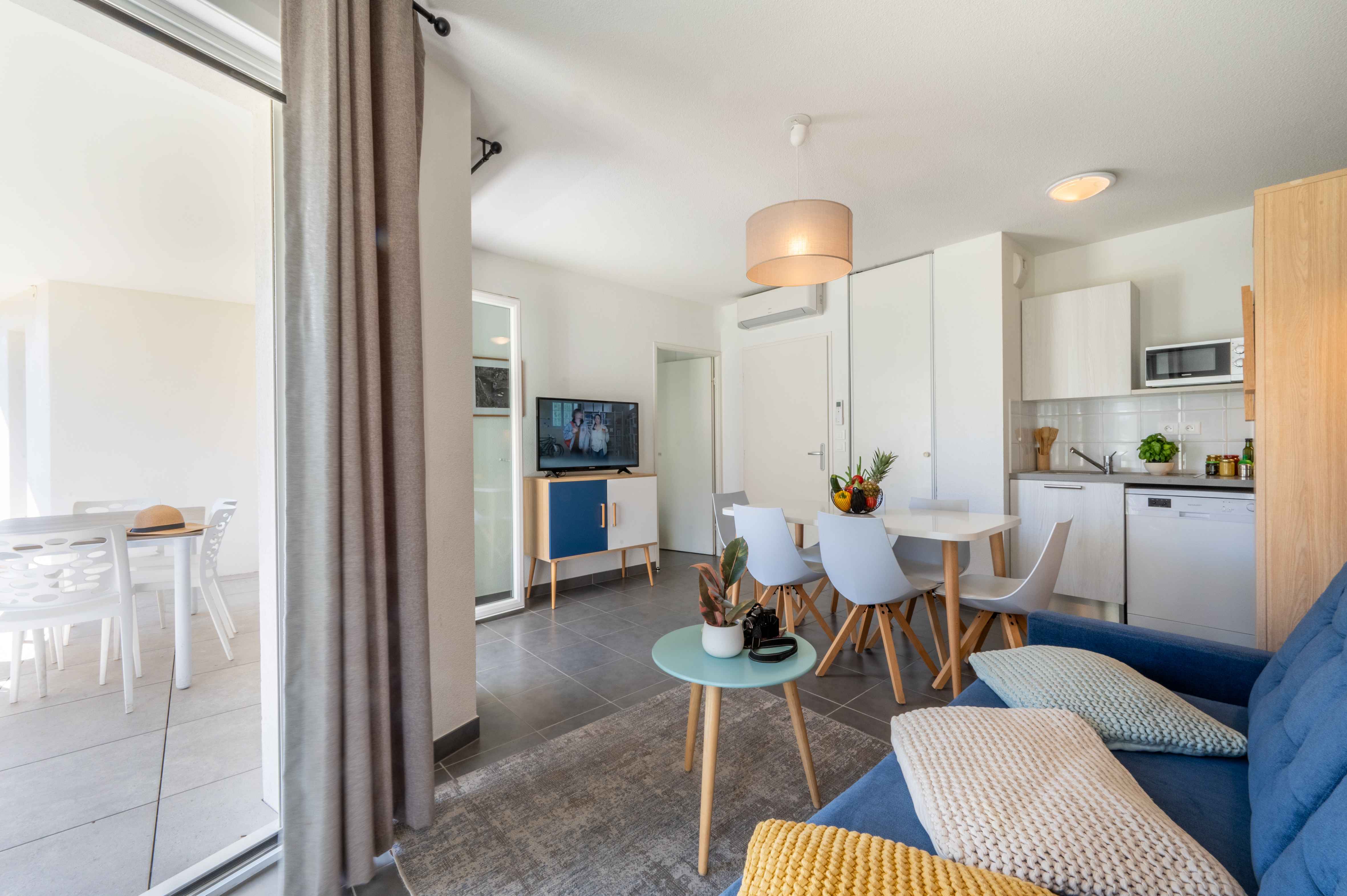 image Bright, fully equipped kitchenette and dining area, ready for everything from a quick breakfast to a leisurely dinner with fresh local produce.