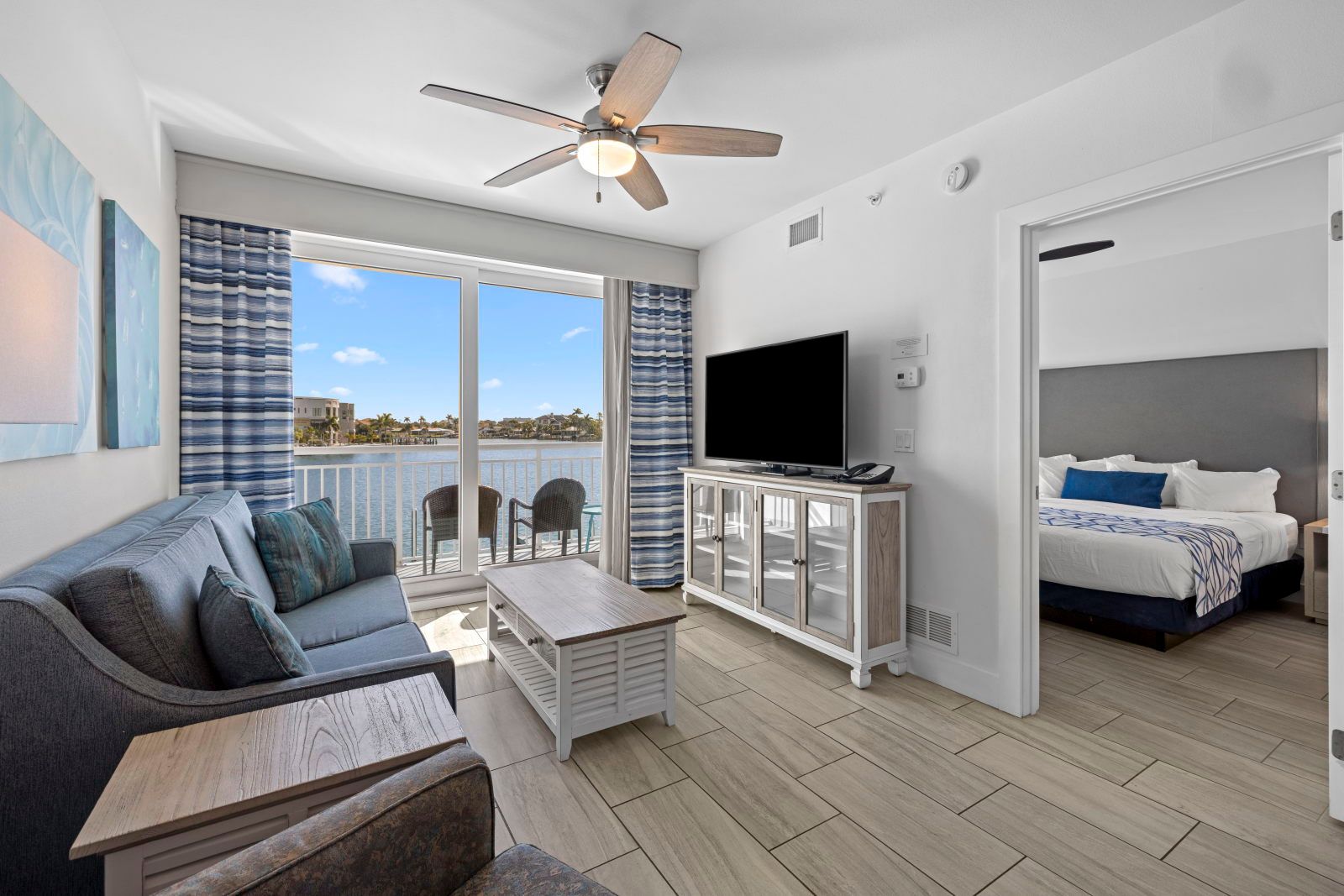 image Unwind in comfort with ample seating and vibrant décor, just steps from the marina views.