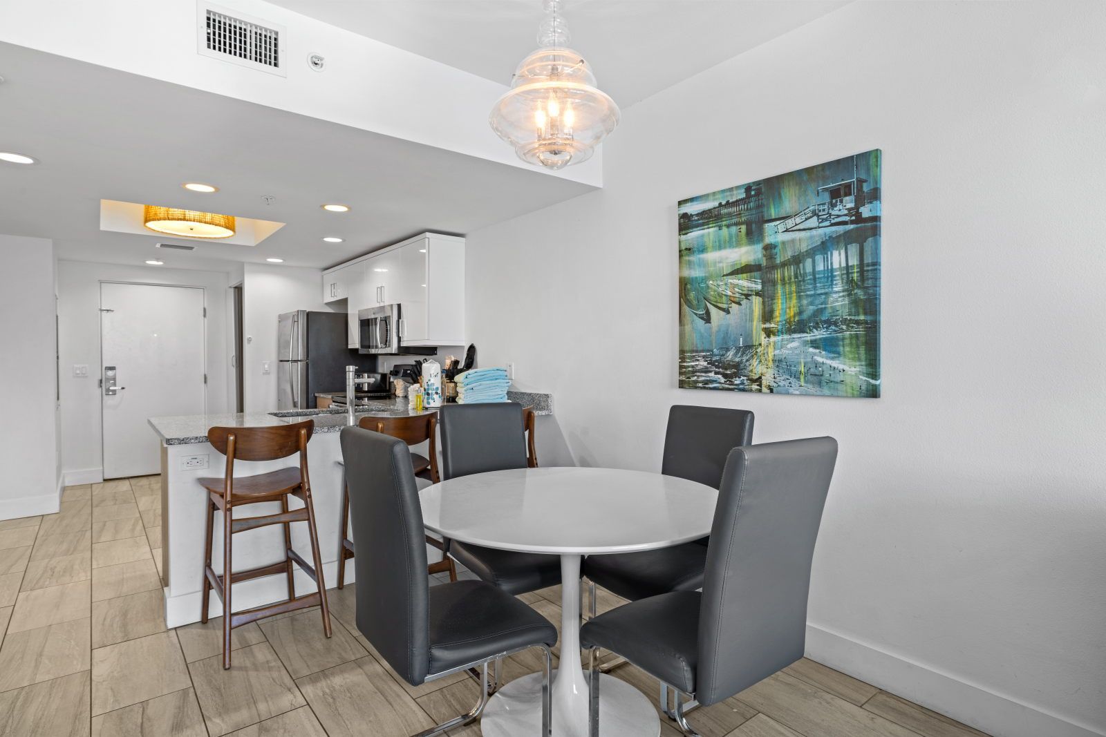 image Gather around the sleek dining table, perfect for shared meals and cherished moments.