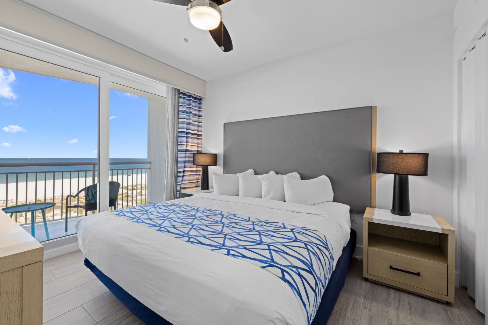 image Relax in this cozy bedroom, complete with a stylish design and inviting natural light.