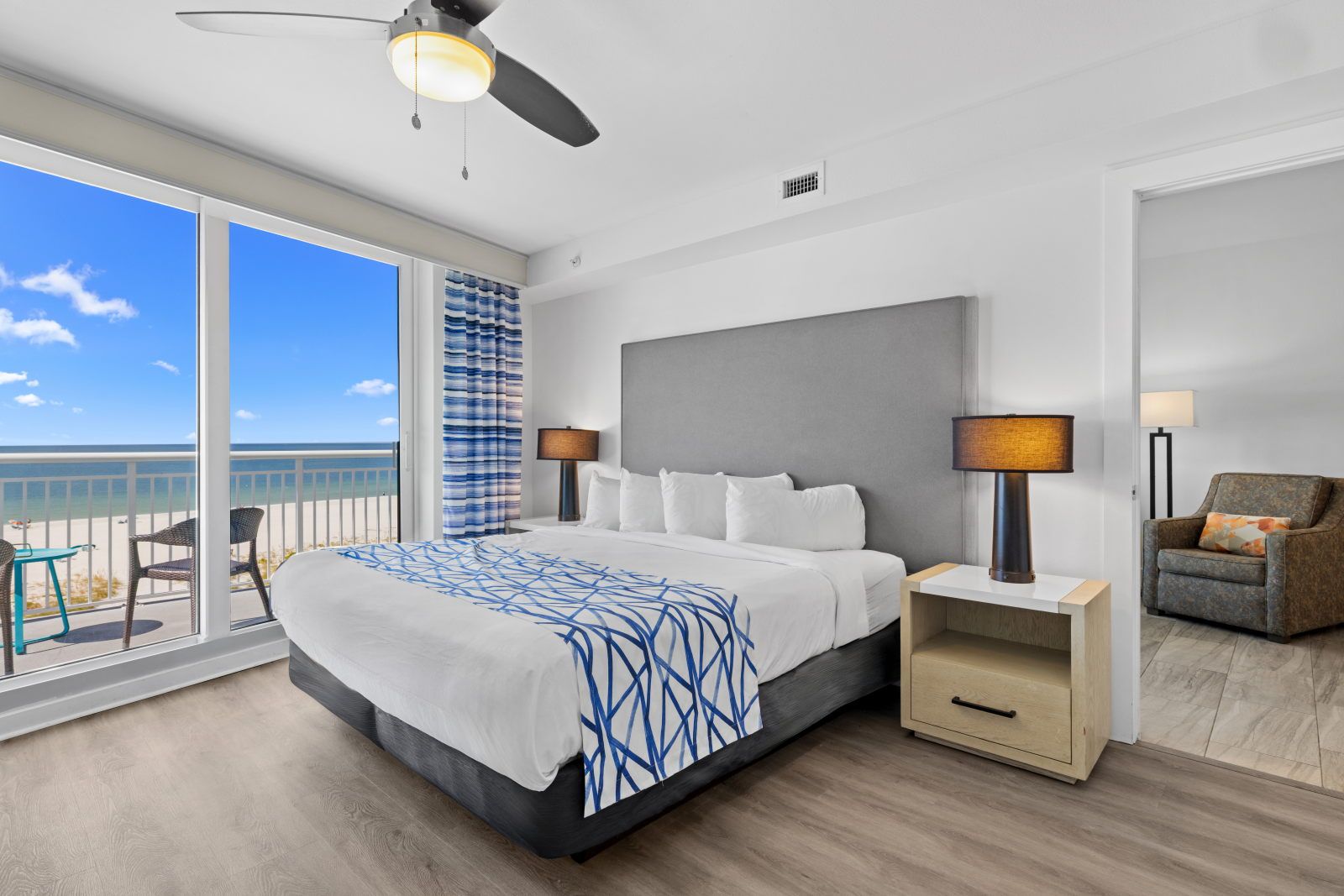 image Awake to views of the sea in this spacious suite, designed for relaxation with beachy decor.