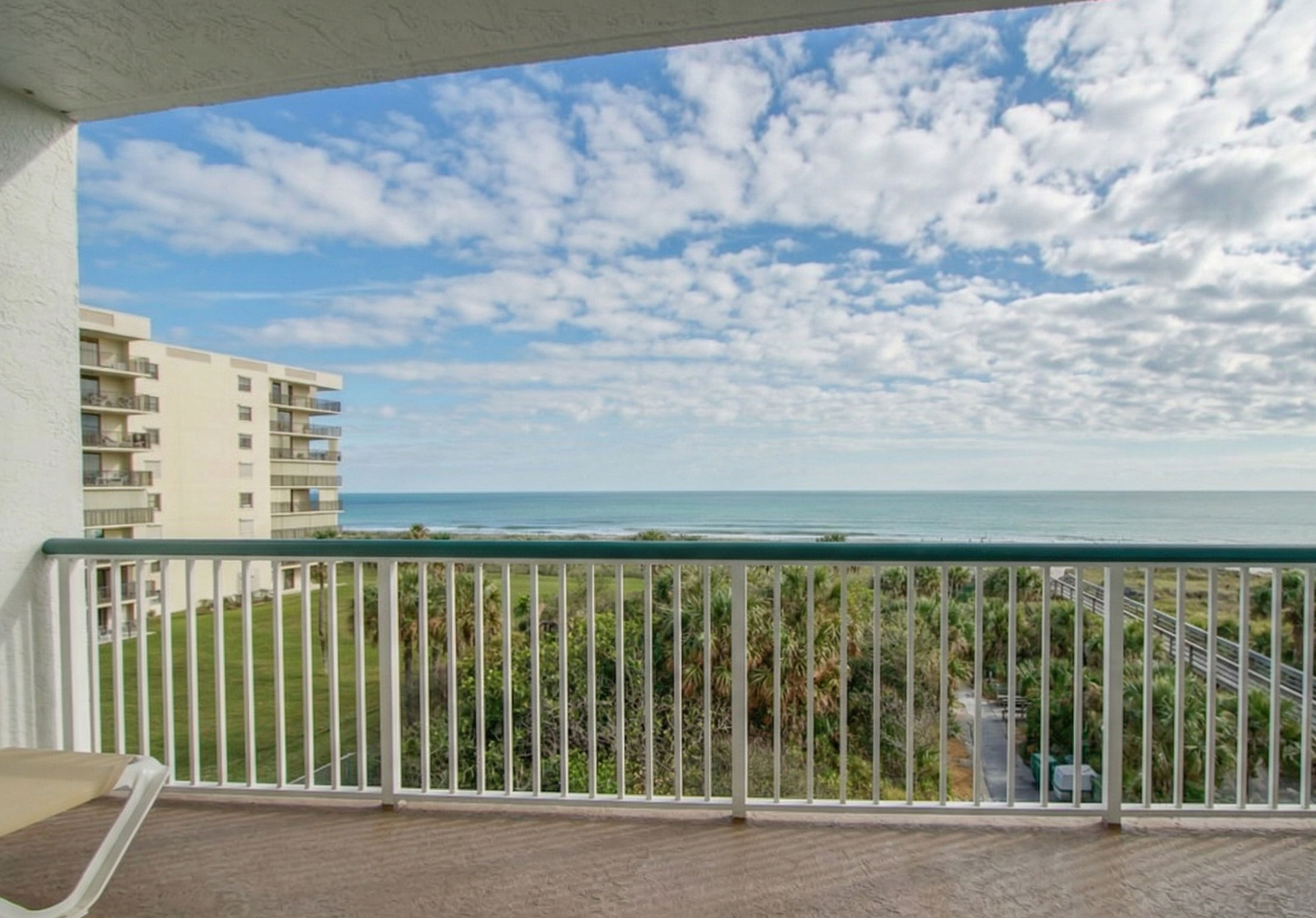 image Sip your morning coffee on the private balcony while soaking in the sea breeze and tranquil views.
