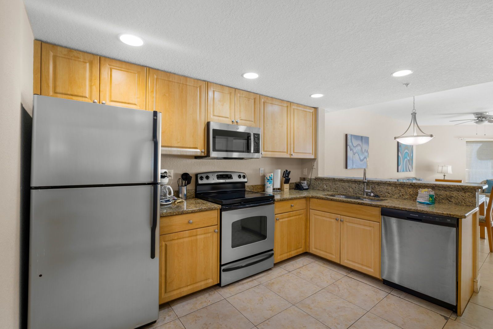 image Cook up your culinary creations in this fully equipped kitchen, featuring modern appliances.