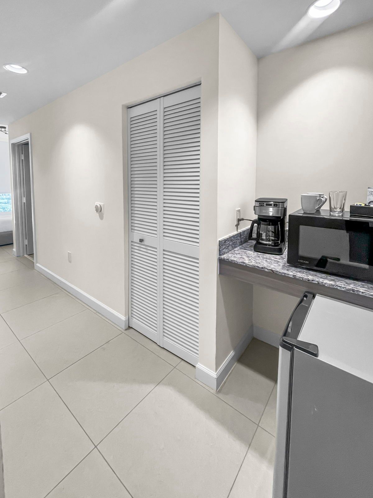 image Enjoy the convenience of the kitchenette, ready for your favorite coffee or meal prep.