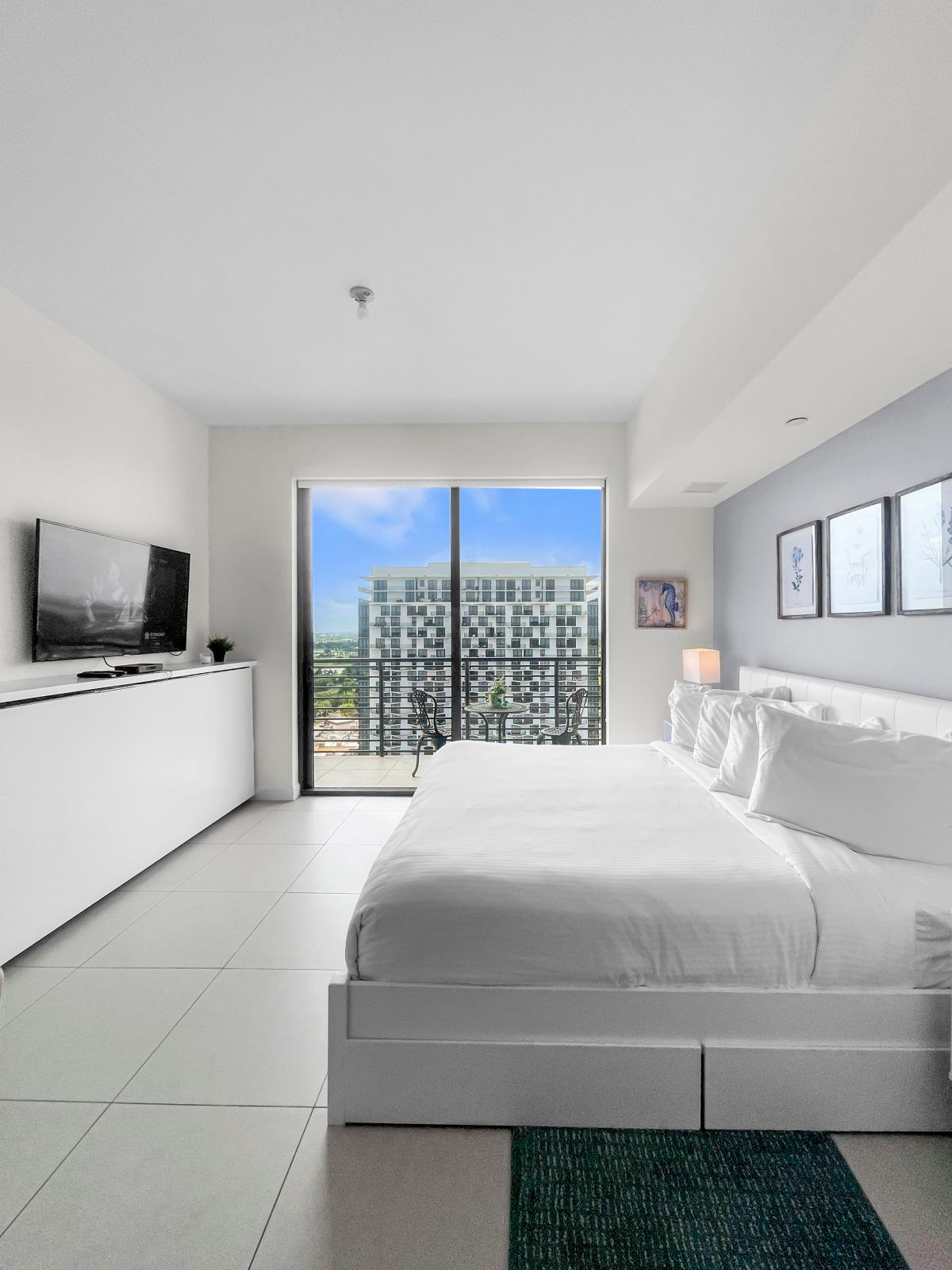 image Brighten your day with natural light streaming through expansive glass doors.