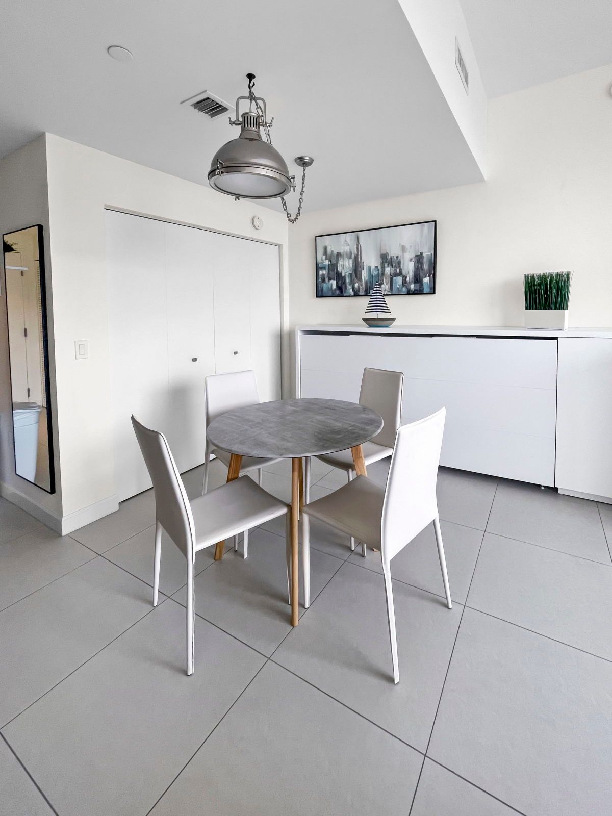image Dine in style at this cozy yet sophisticated dining area, designed for intimate meals.