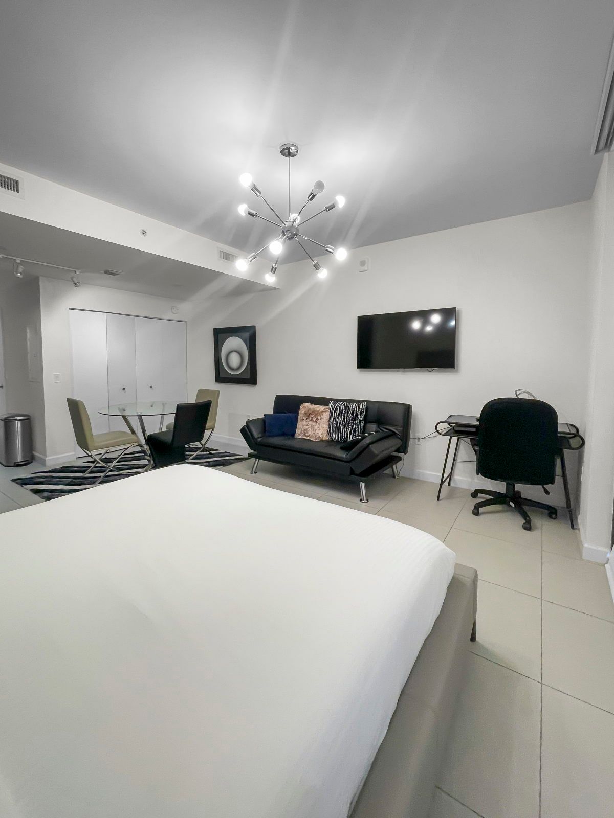 image Unwind in a cozy living space, featuring a stylish sofa and modern amenities for your comfort.