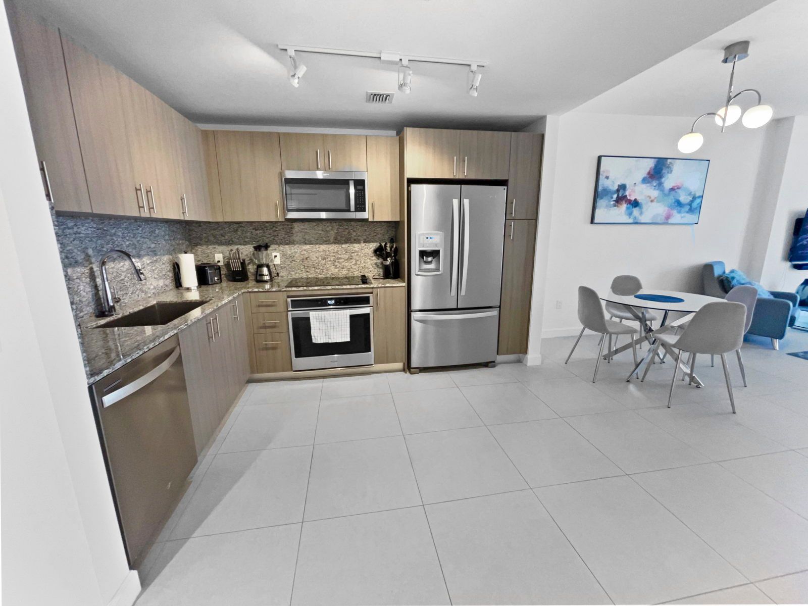 image Cook up a feast in the modern kitchen, featuring sleek appliances and stylish cabinetry.