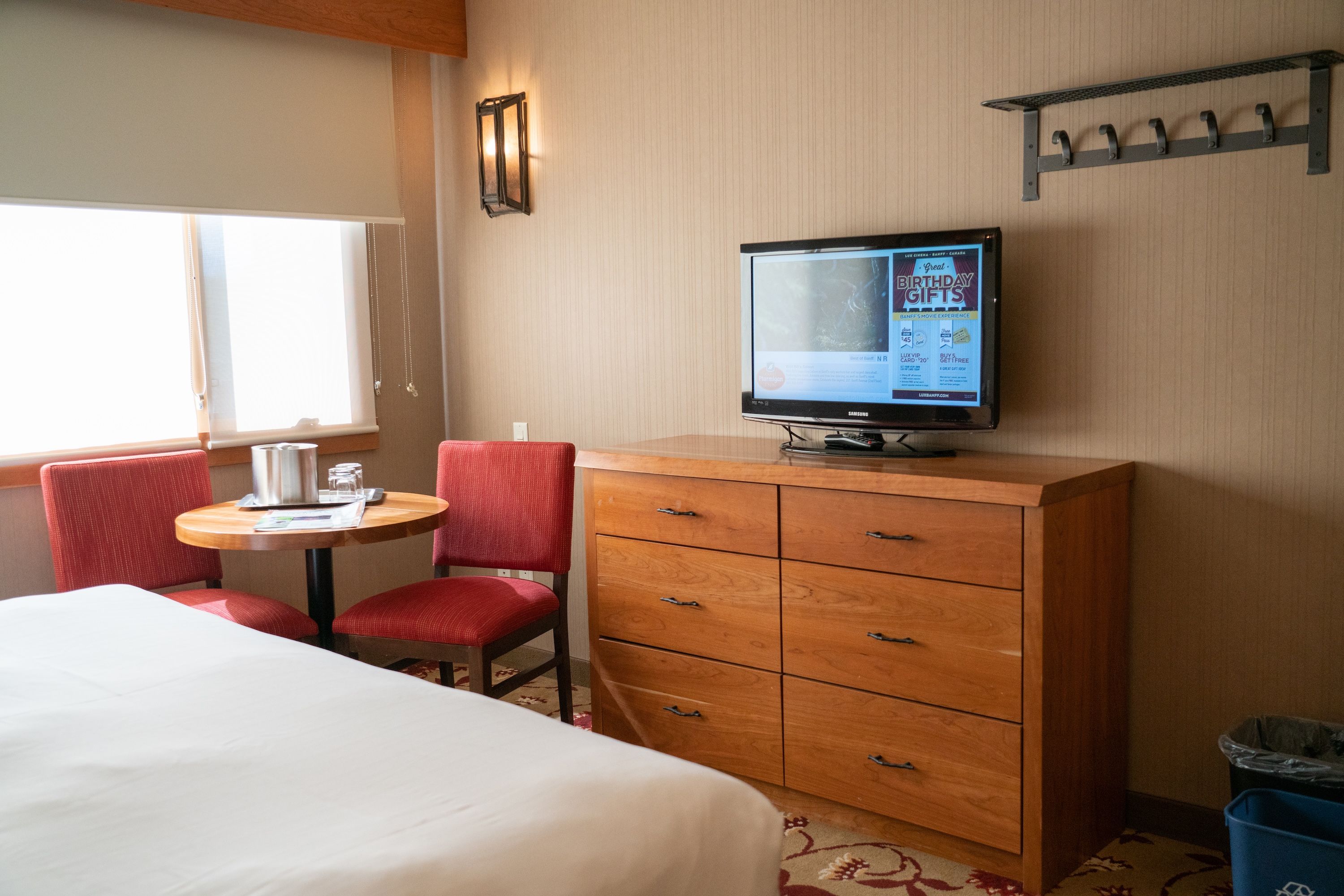 image After a day on the slopes or the Banff Gondola, settle in with the flat-screen TV and the mini fridge stocked your way