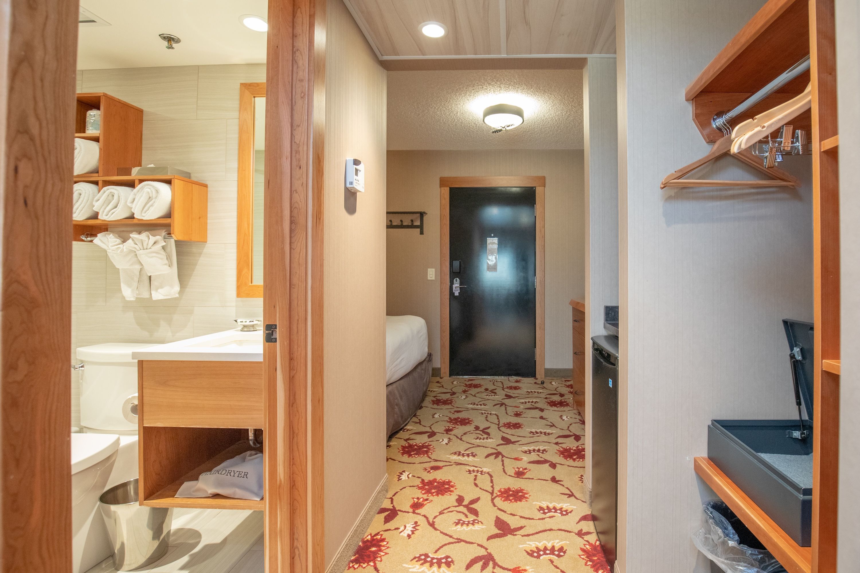 image Centrally placed between both sleeping areas, the bathroom has a shower-tub combo and complimentary Rocky Mountain Soap