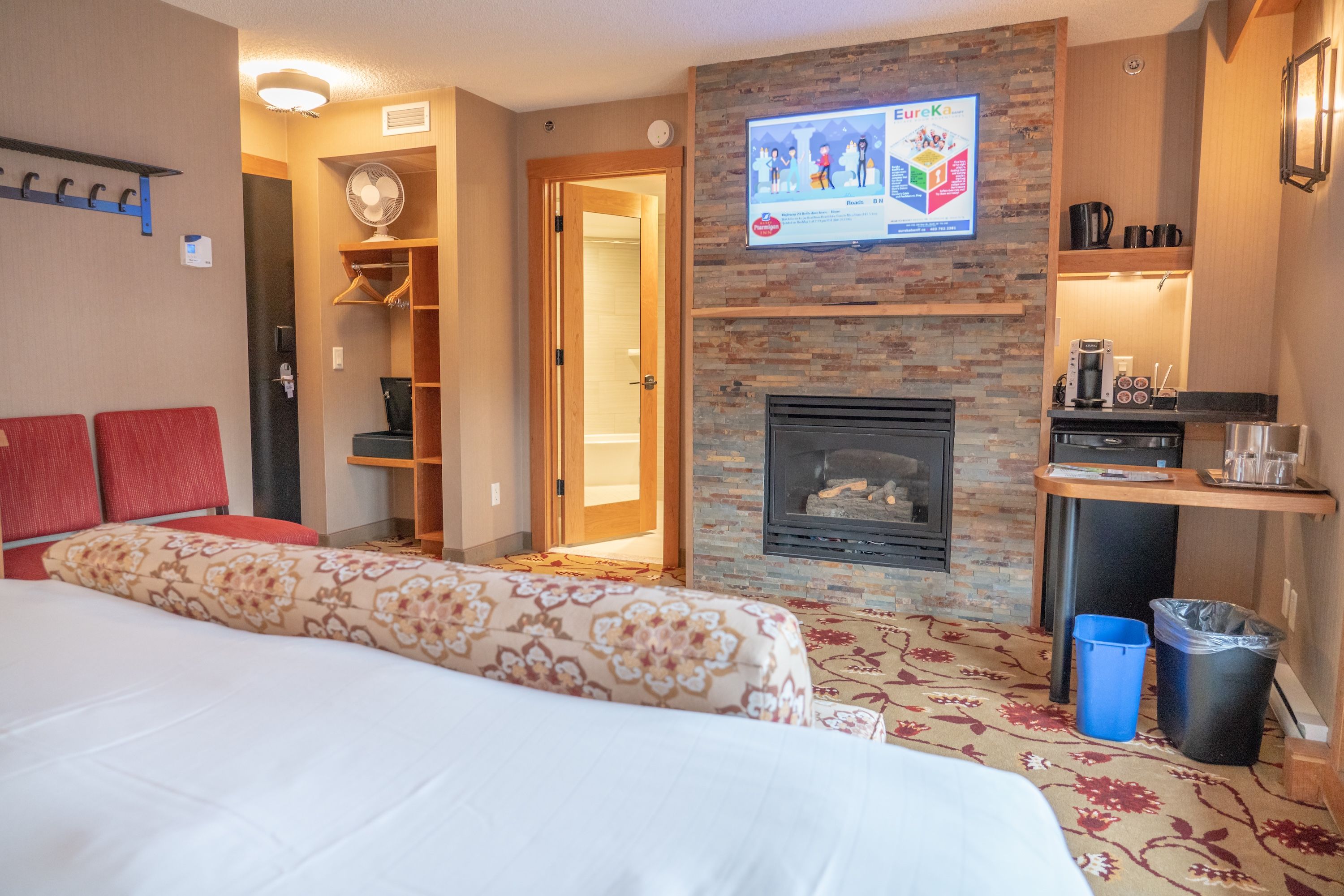 image Unwind by the electric fireplace after a day exploring Banff. Enjoy movie nights with the flat-screen TV just steps away