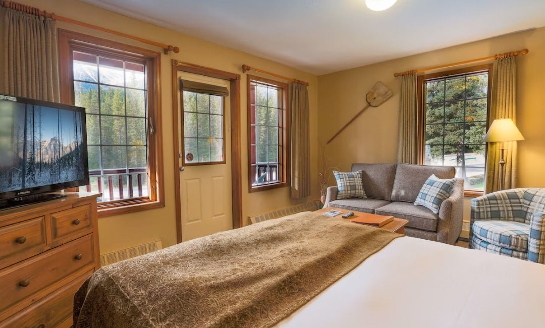 image Unwind on the couch or enjoy mountain vistas from this inviting seating area.