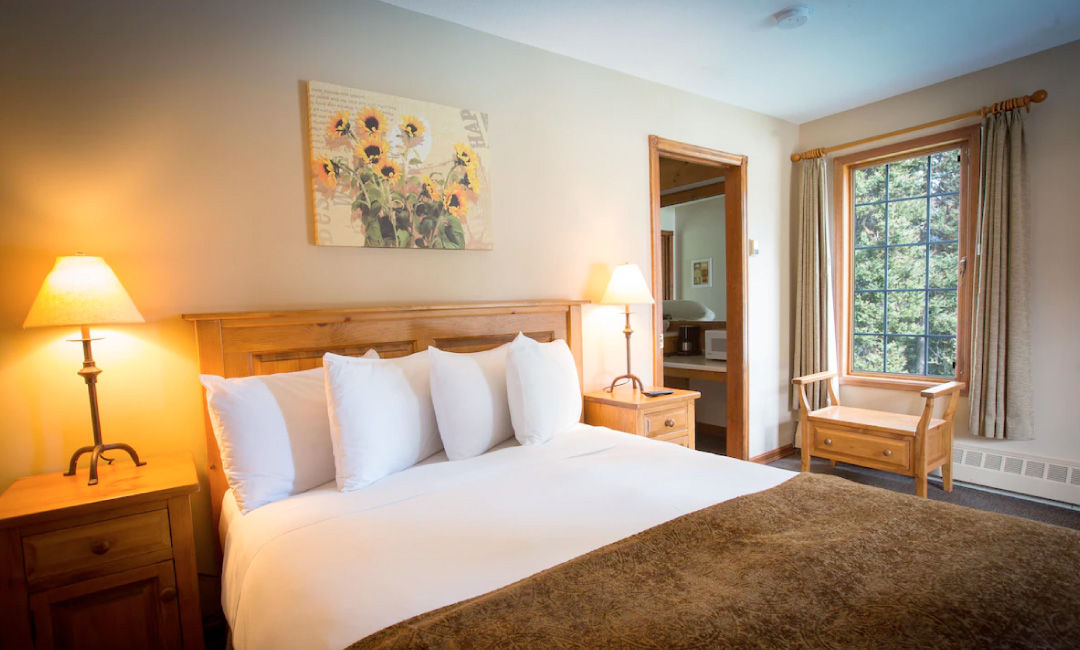 image Rest in comfort among warm tones and soft pillows, perfect for a peaceful night's sleep.