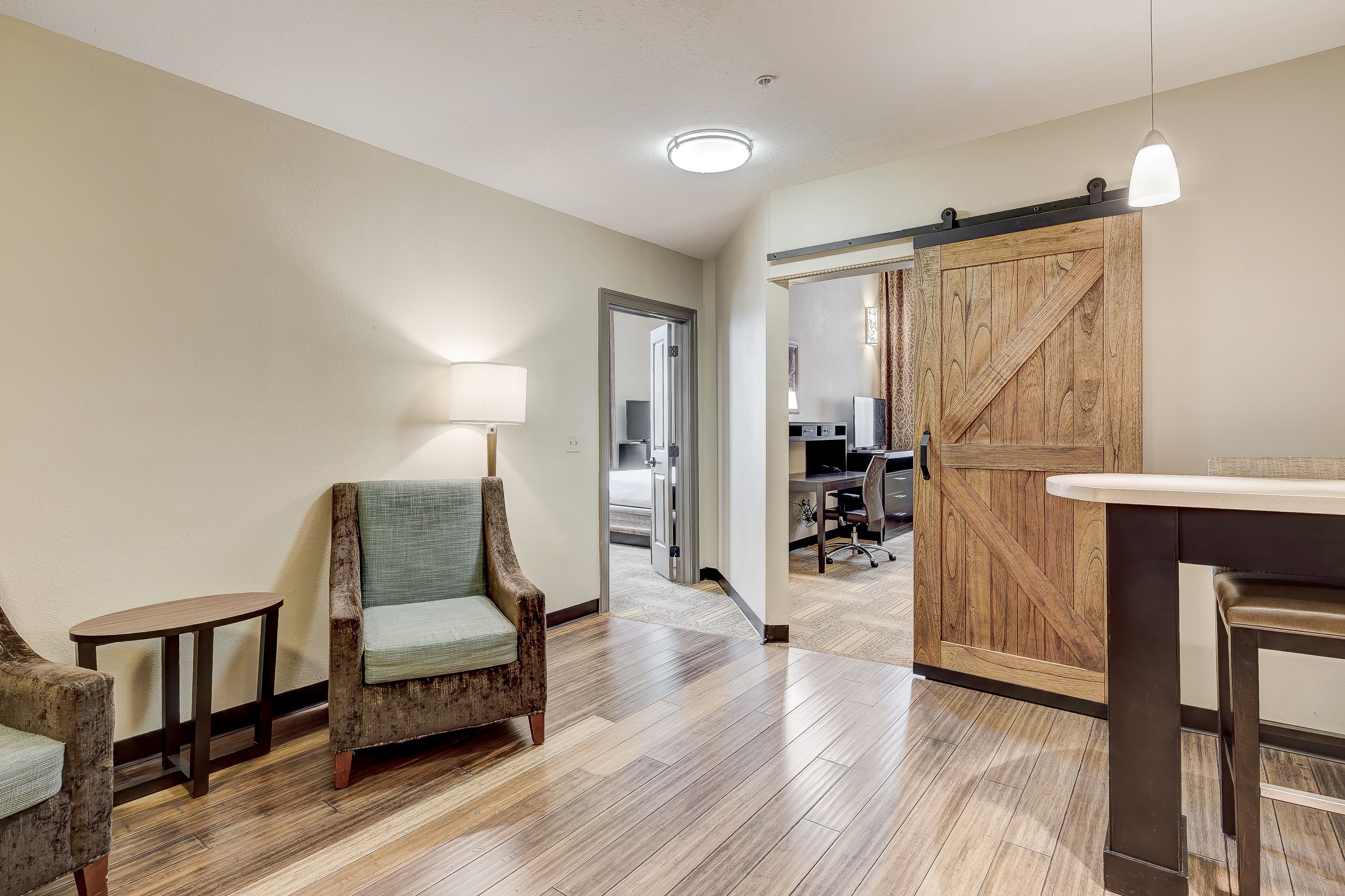 image Cozy sitting area with modern decor and warm lighting.