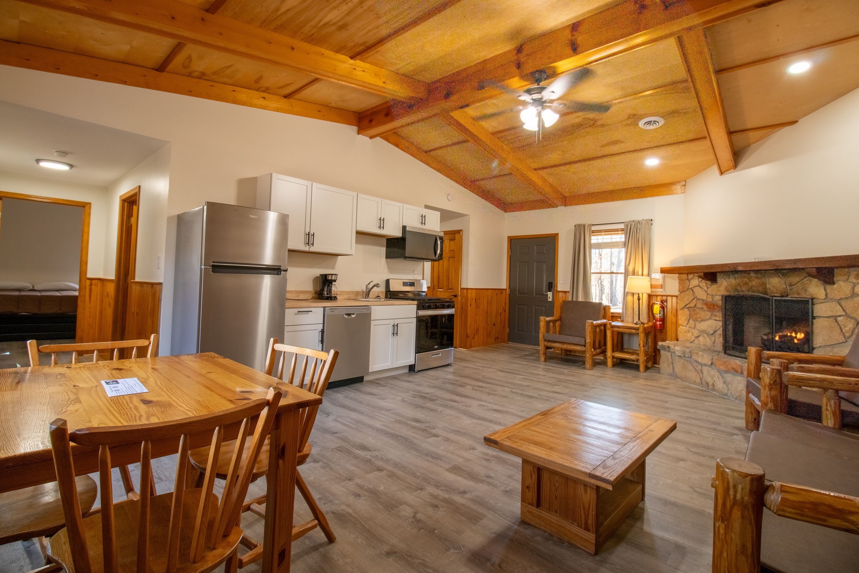 image Gather around the rustic dining table after cooking in your fully equipped kitchen.