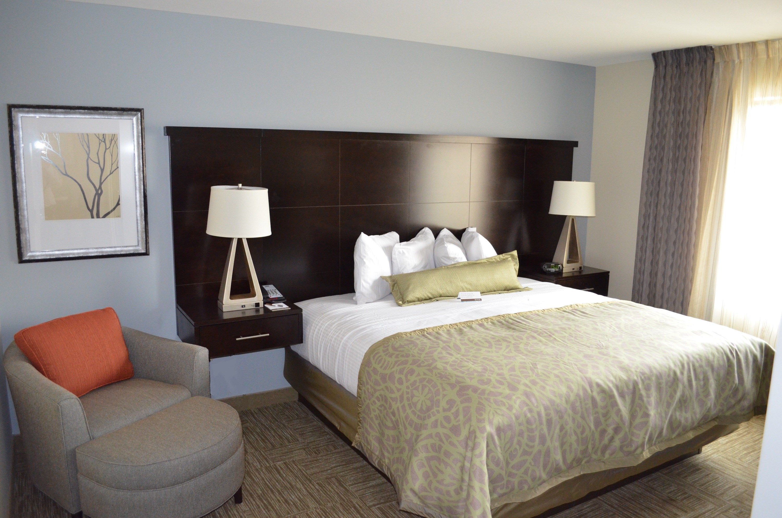 image King bedroom with bed and seating area.