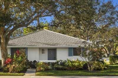 Private cottage set among tropical gardens — each with its own outdoor terrace just steps from the resort