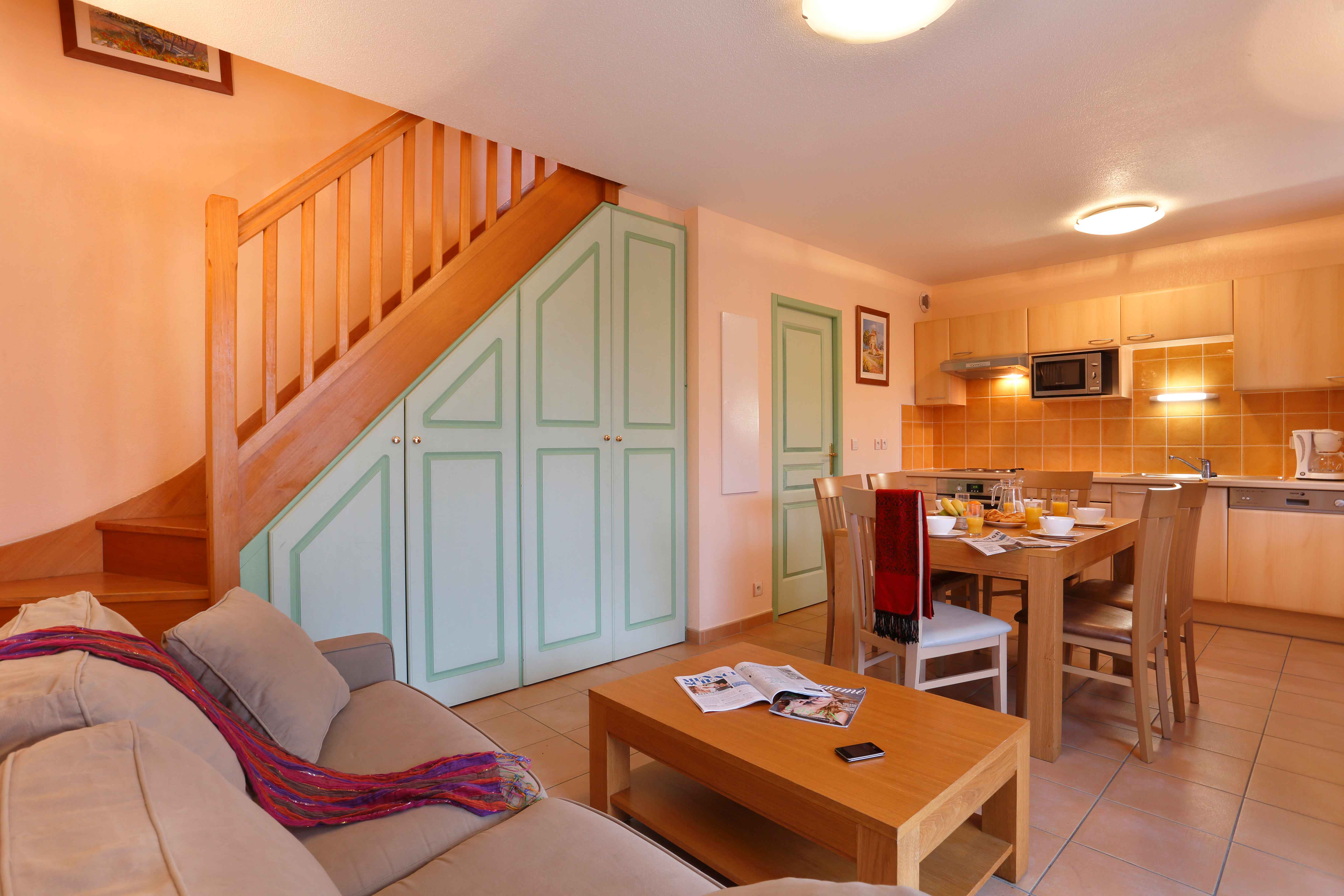 image Double sofa bed in the living area sleeps two extra guests, with TV and direct access to the terrace