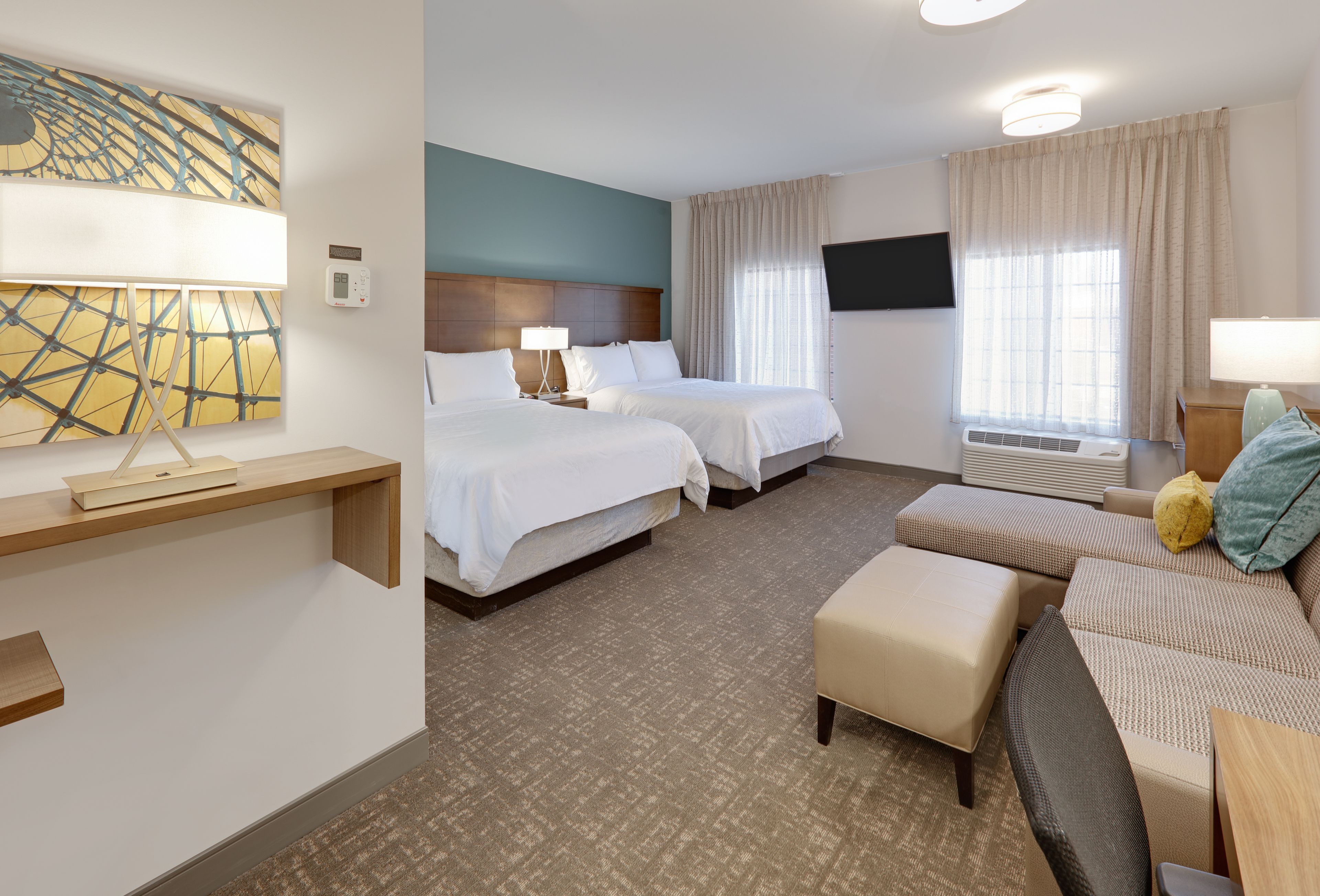 image Contemporary suite with abundant natural light and thoughtful design.
