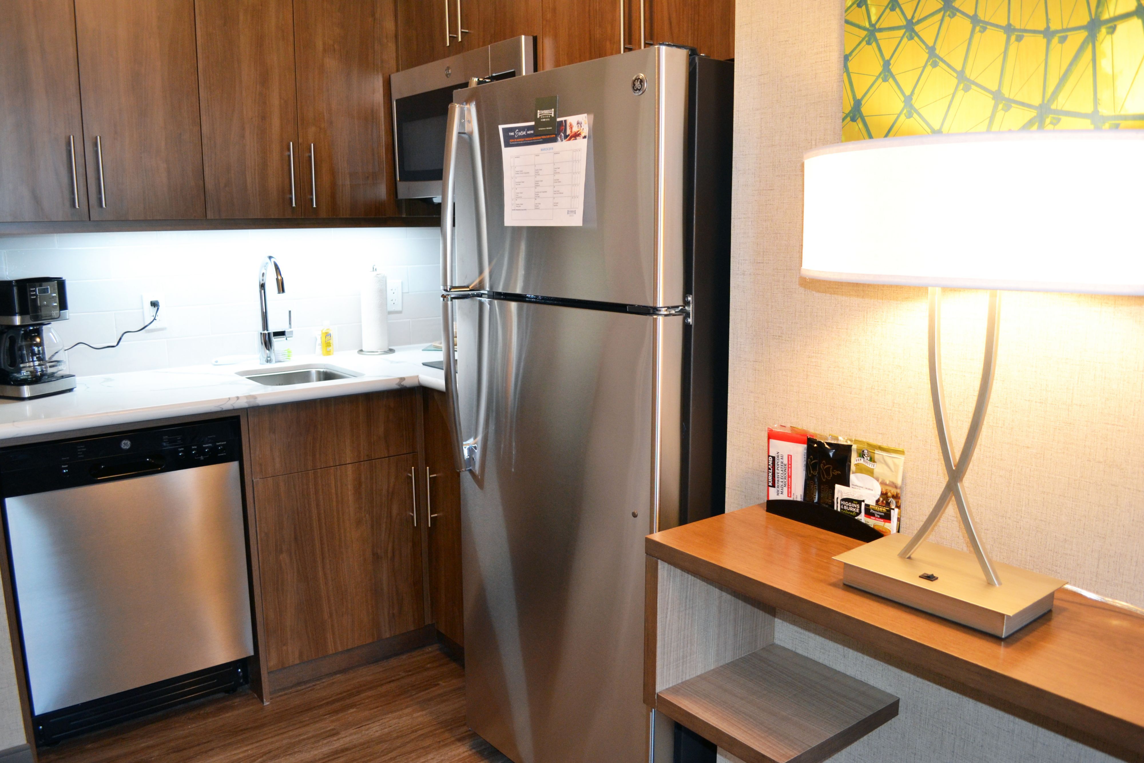 image Fully equipped kitchen with stainless steel appliances.