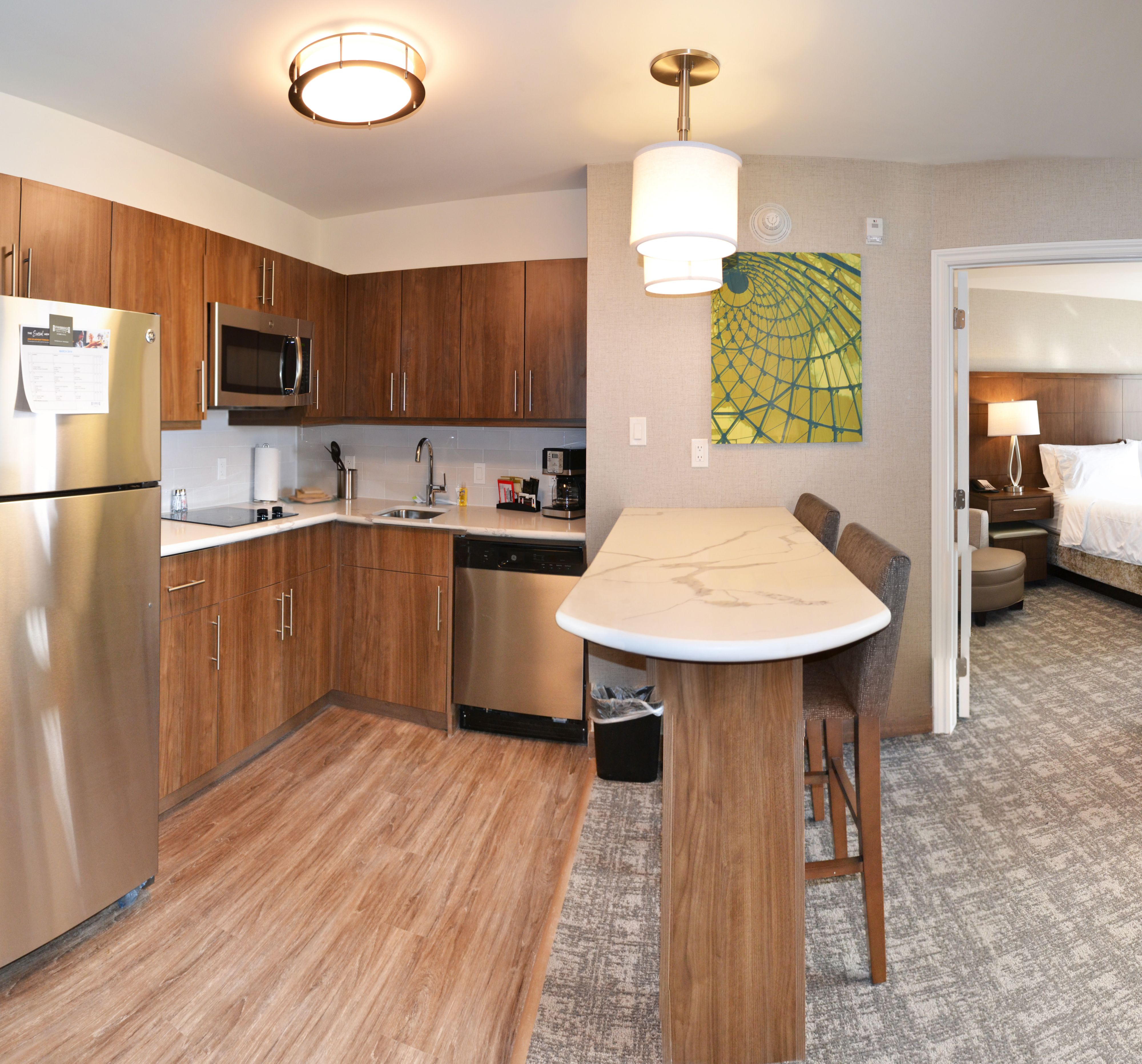 image Modern kitchen with stainless steel appliances and ample counter space.