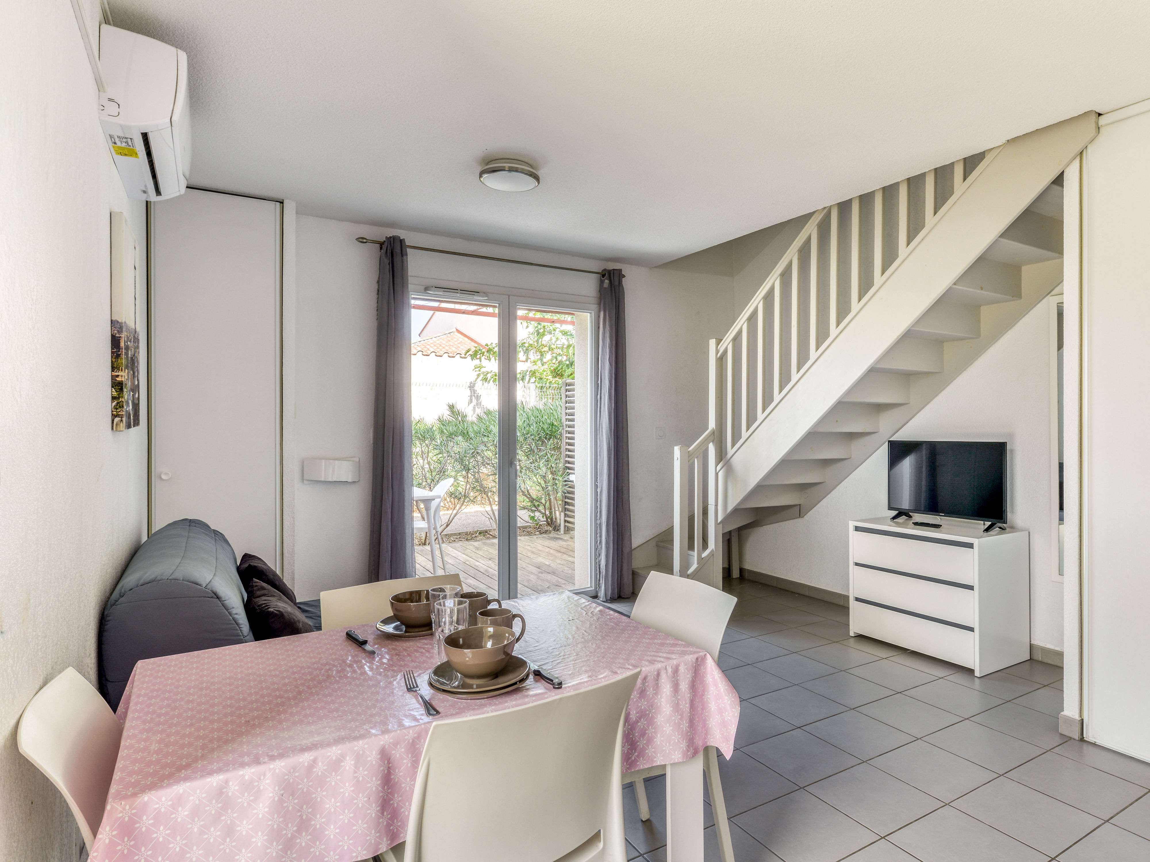 image Dining area with patio doors — natural light pours in from the terrace