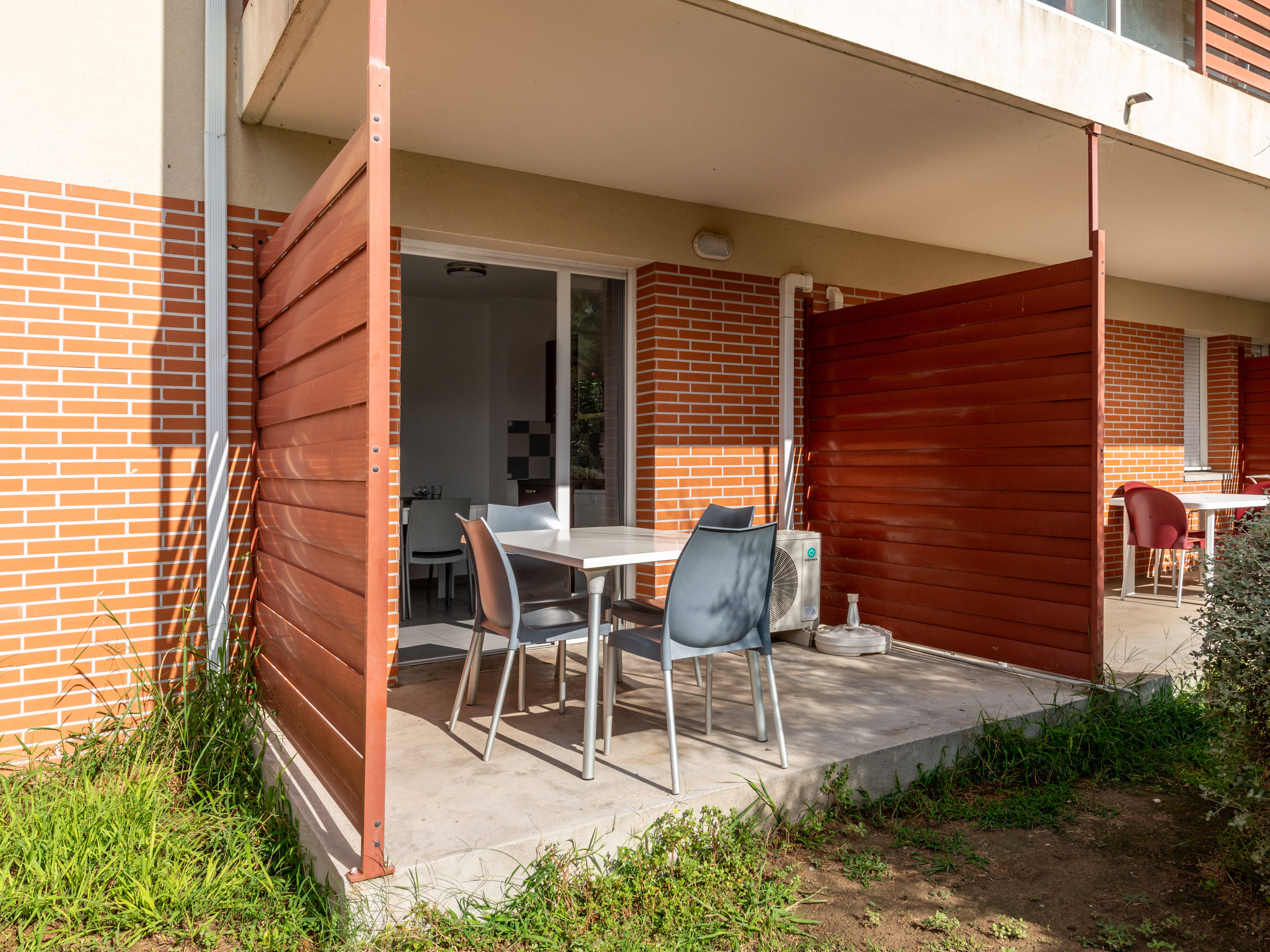 image Furnished terrace for morning coffee before the 2 km drive to Plage des Pins