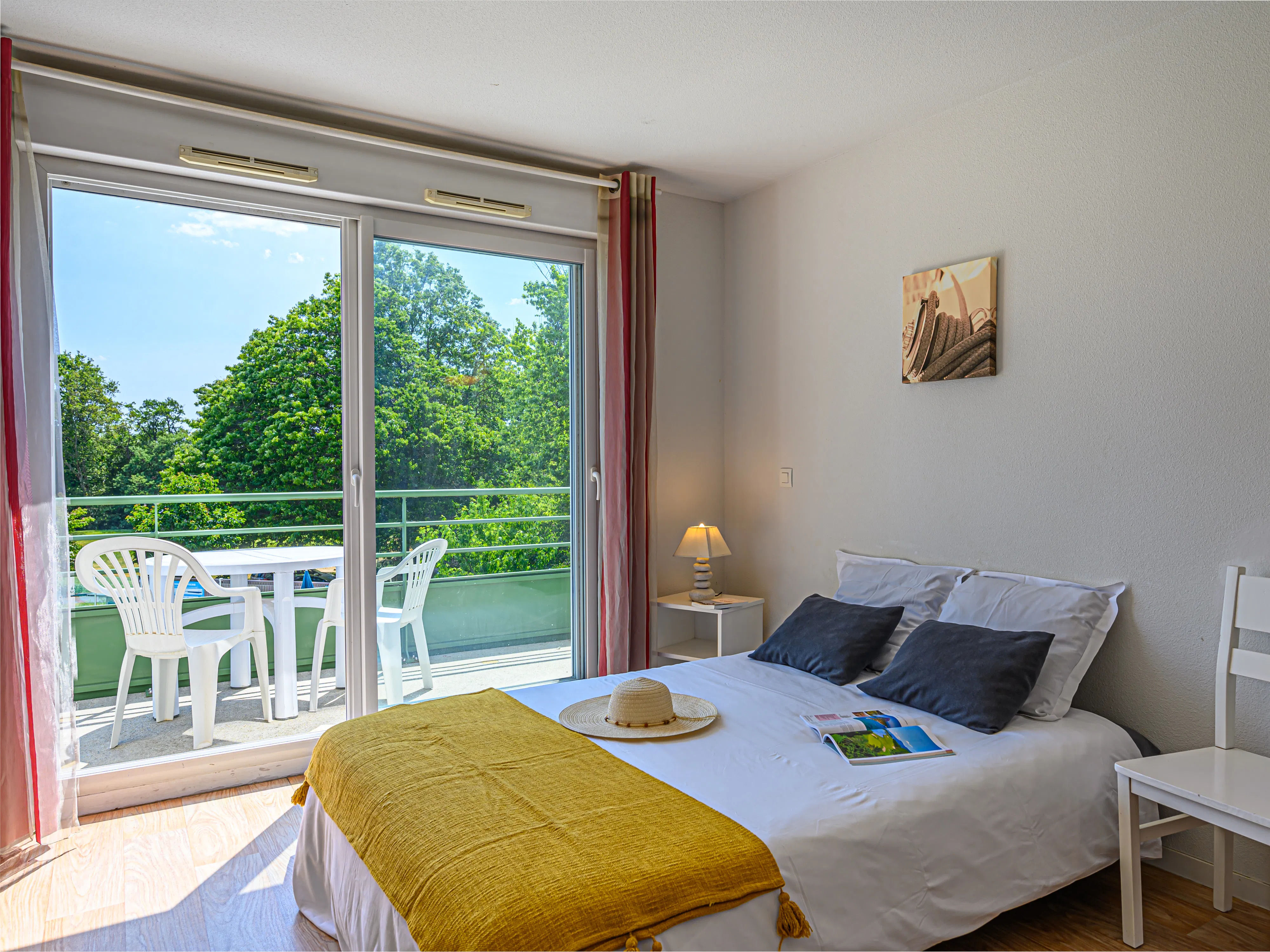 image Sunlight fills the room in the morning — a bright start before you head out on the GR34 coastal trail.