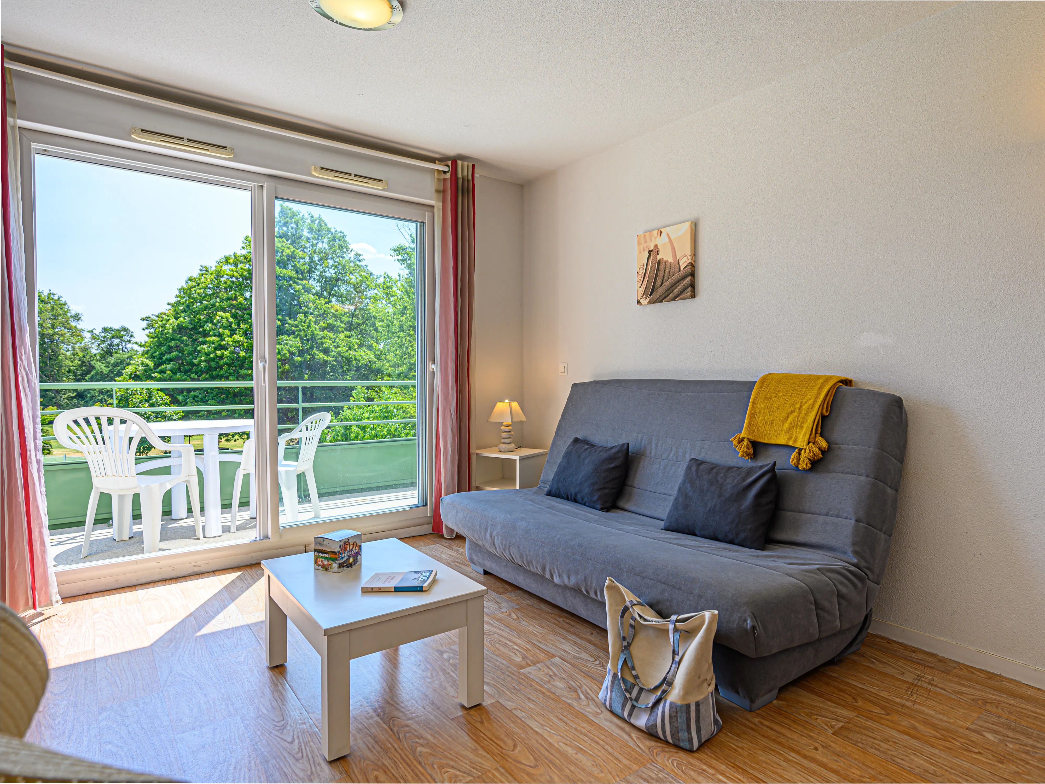 image Double sofa bed by the window — pull it out at night, lounge on it by day after exploring Vannes old town.