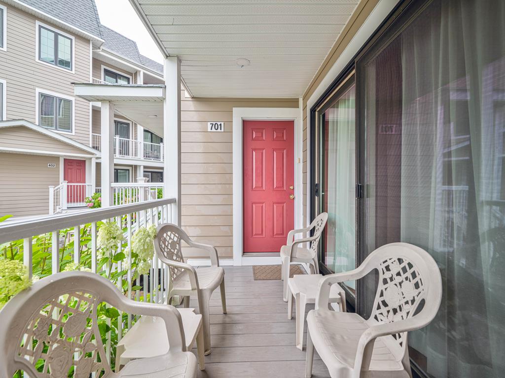 image Welcome to your cozy getaway! A bright entrance with cheerful decor awaits your arrival.
